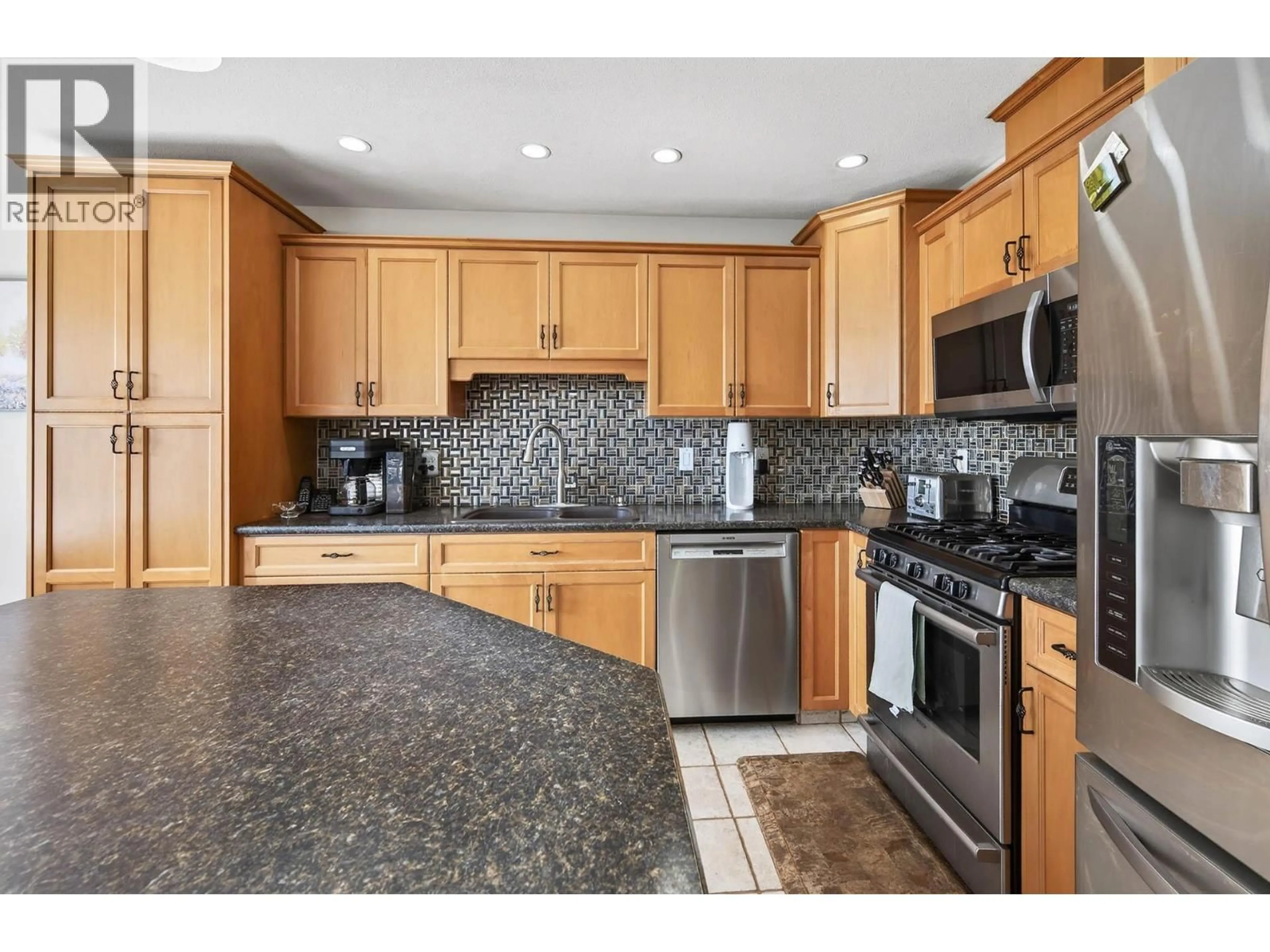 Open concept kitchen, ceramic/tile floor for 1968 SASKATOON PLACE, Kamloops British Columbia V2E2T1