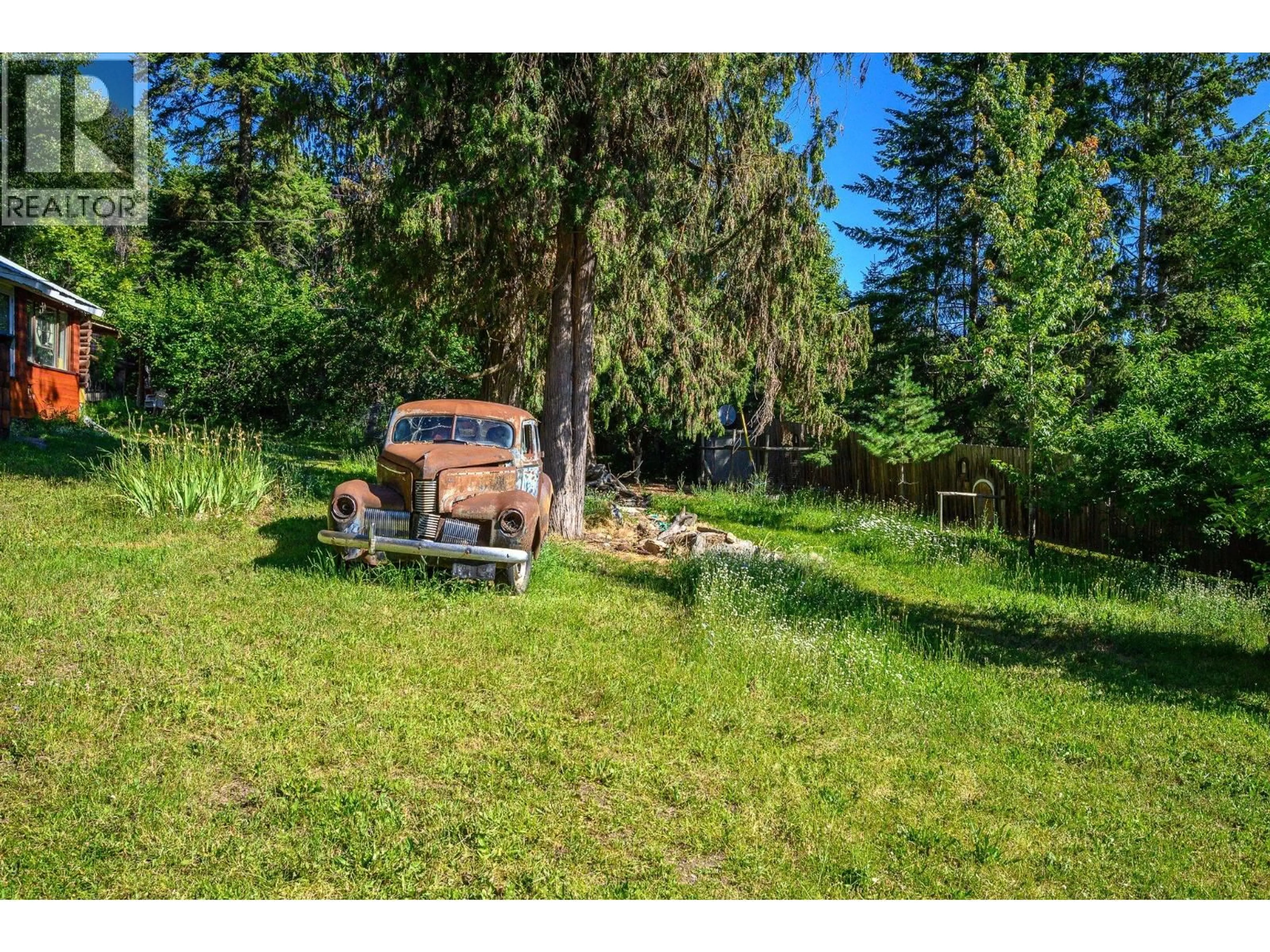 A pic from outside/outdoor area/front of a property/back of a property/a pic from drone, forest/trees view for 136 97B HIGHWAY, Enderby British Columbia V4Y4G7