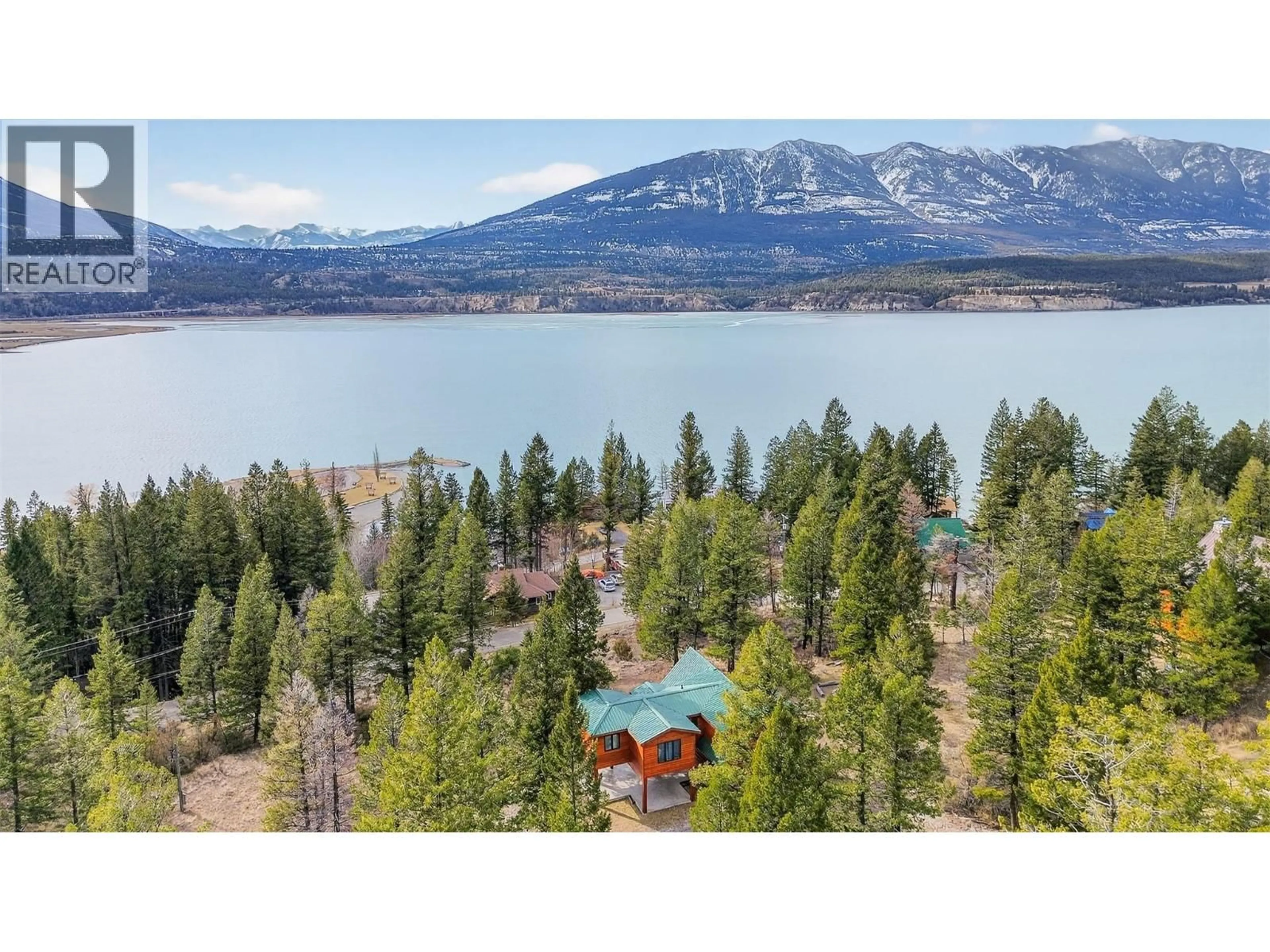 A pic from outside/outdoor area/front of a property/back of a property/a pic from drone, water/lake/river/ocean view for 8437 BIGHORN SHEEP LANE, Canal Flats British Columbia V0B1B0