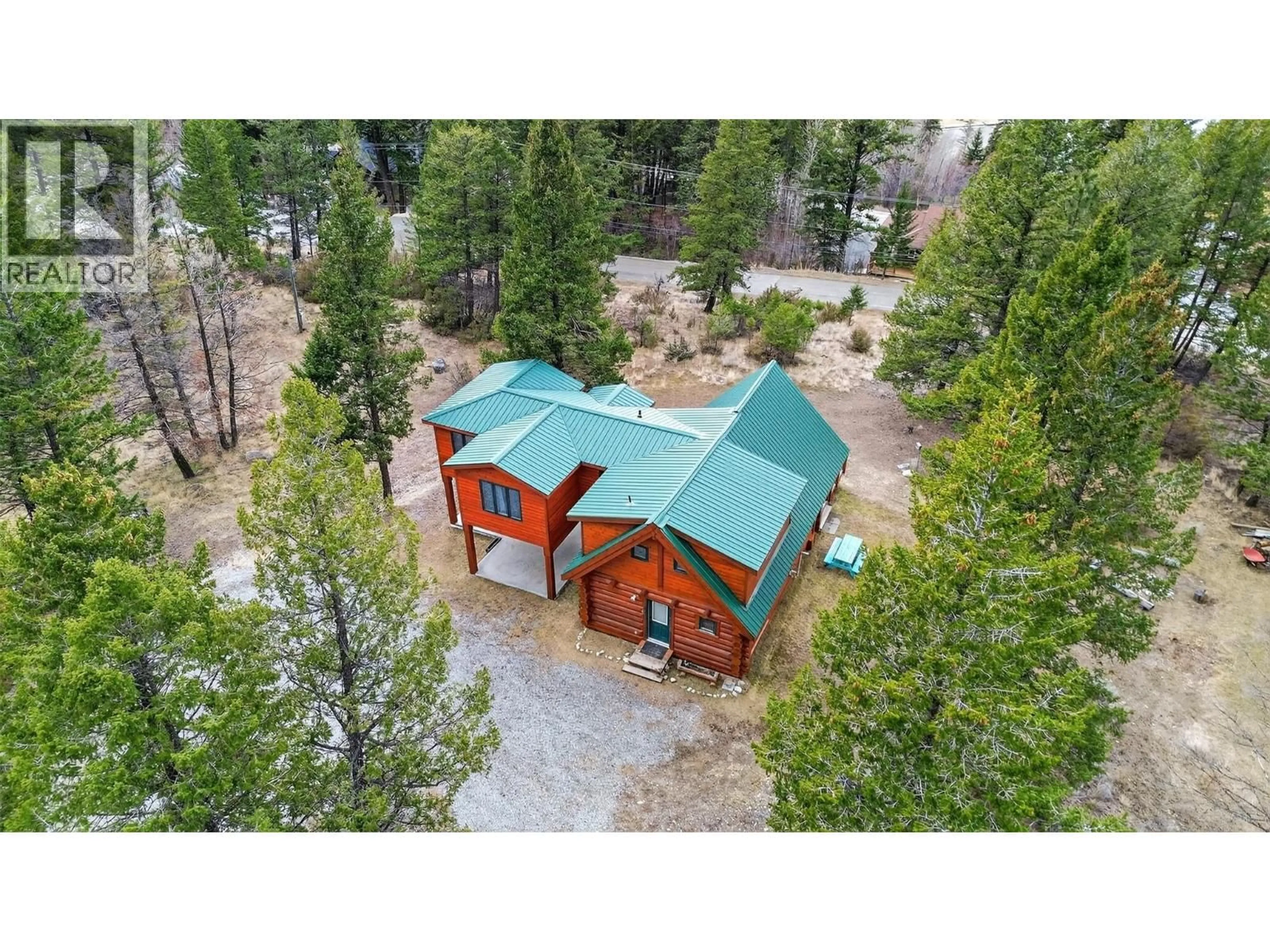 A pic from outside/outdoor area/front of a property/back of a property/a pic from drone, forest/trees view for 8437 BIGHORN SHEEP LANE, Canal Flats British Columbia V0B1B0