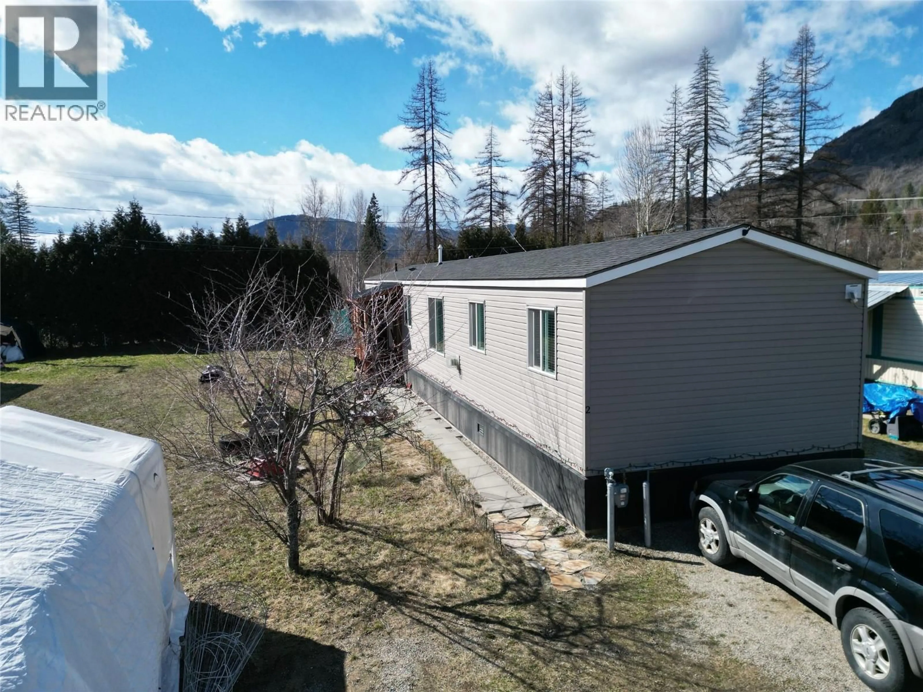 A pic from outside/outdoor area/front of a property/back of a property/a pic from drone, unknown for 2 - 1034 HIGHWAY 3B OTHER, Montrose British Columbia V0G1P0