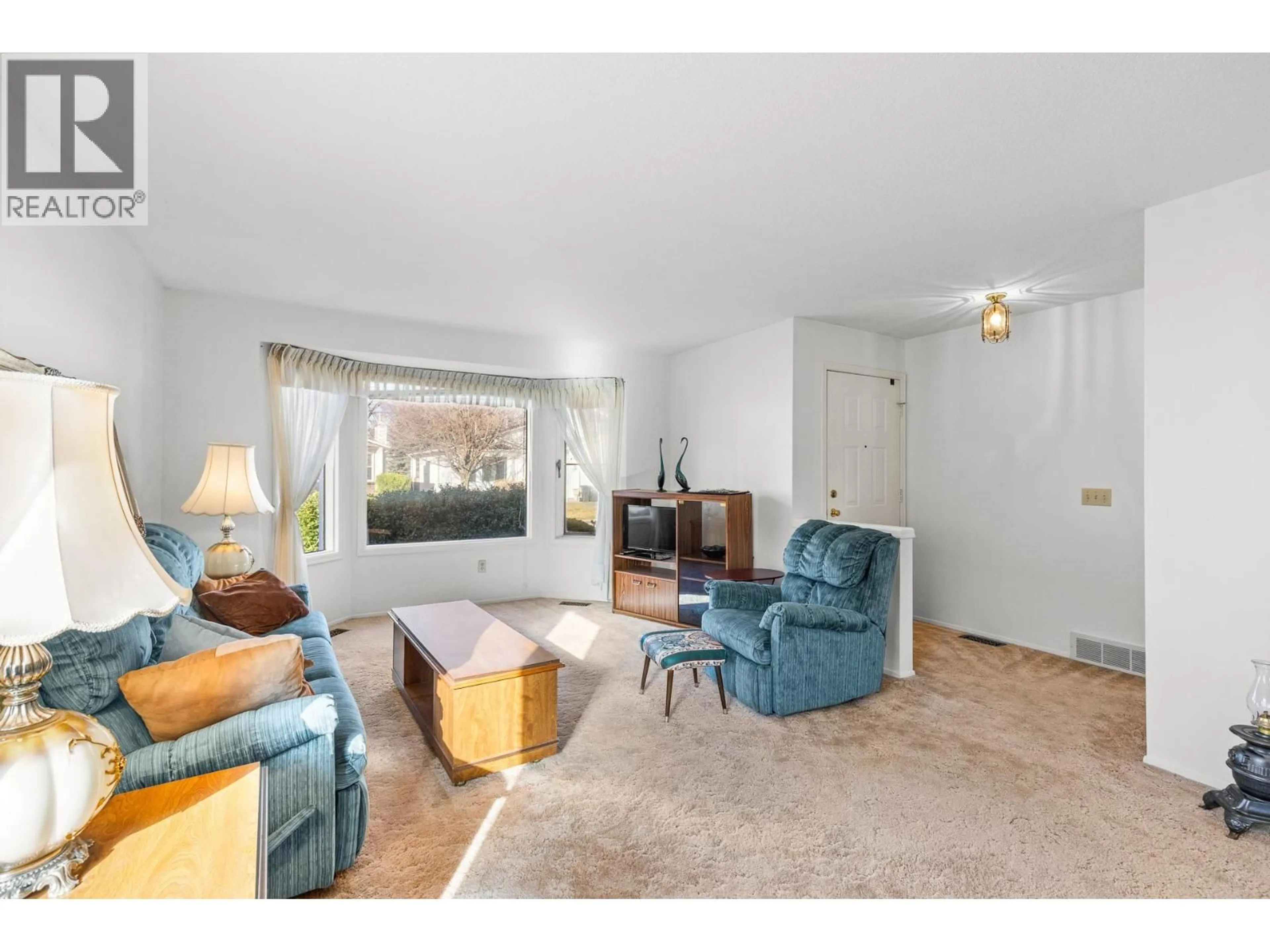 Living room with furniture, unknown for 322 - 1260 RAYMER ROAD, Kelowna British Columbia V1W3S5