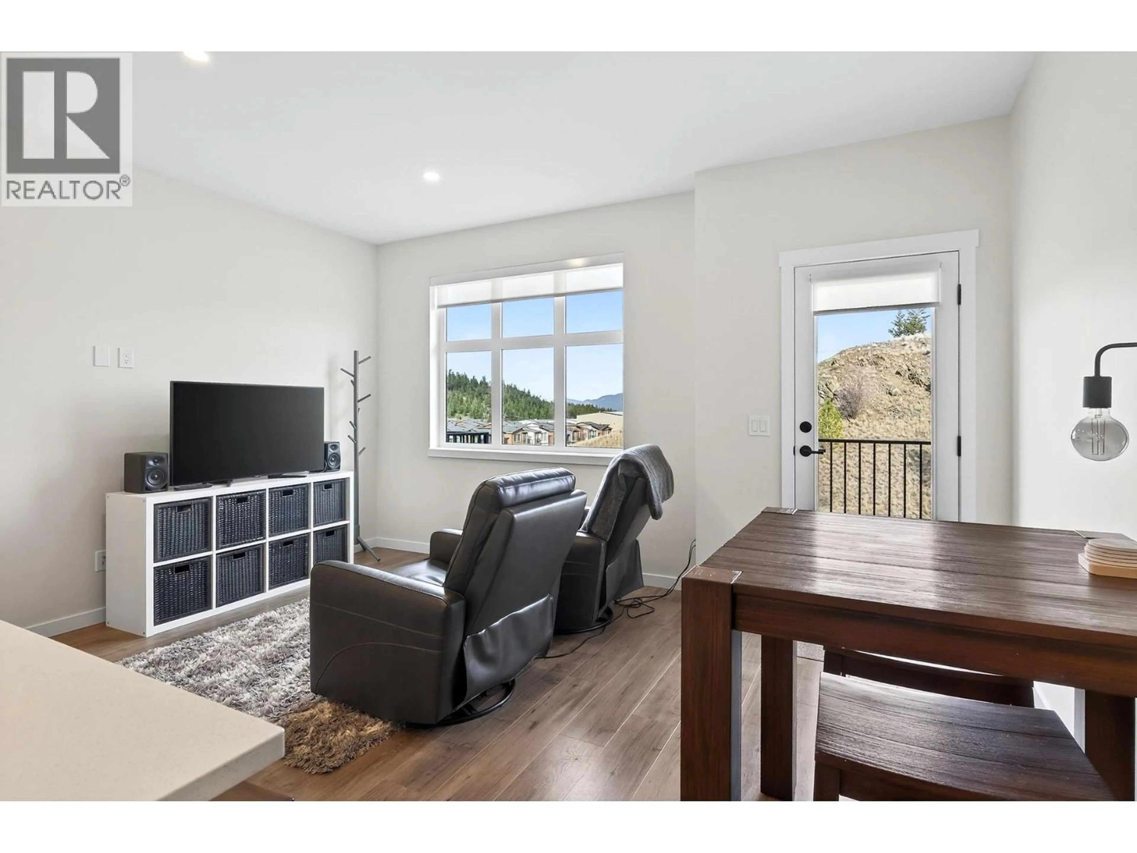 Living room with furniture, wood/laminate floor for 110 - 1701 FOXTAIL DRIVE, Kamloops British Columbia V1S0E9