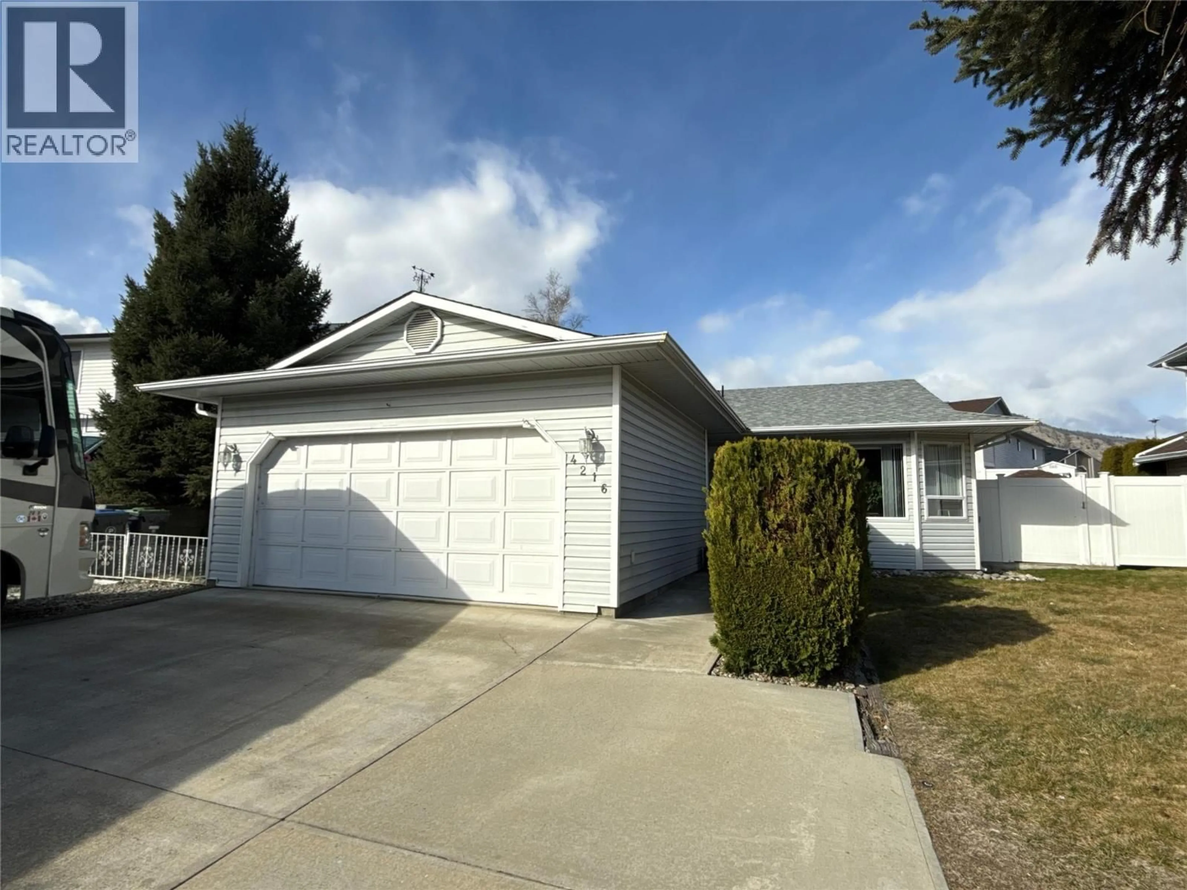 Home with vinyl exterior material, street for 4216 LOBELIA DRIVE, Osoyoos British Columbia V0H1V1