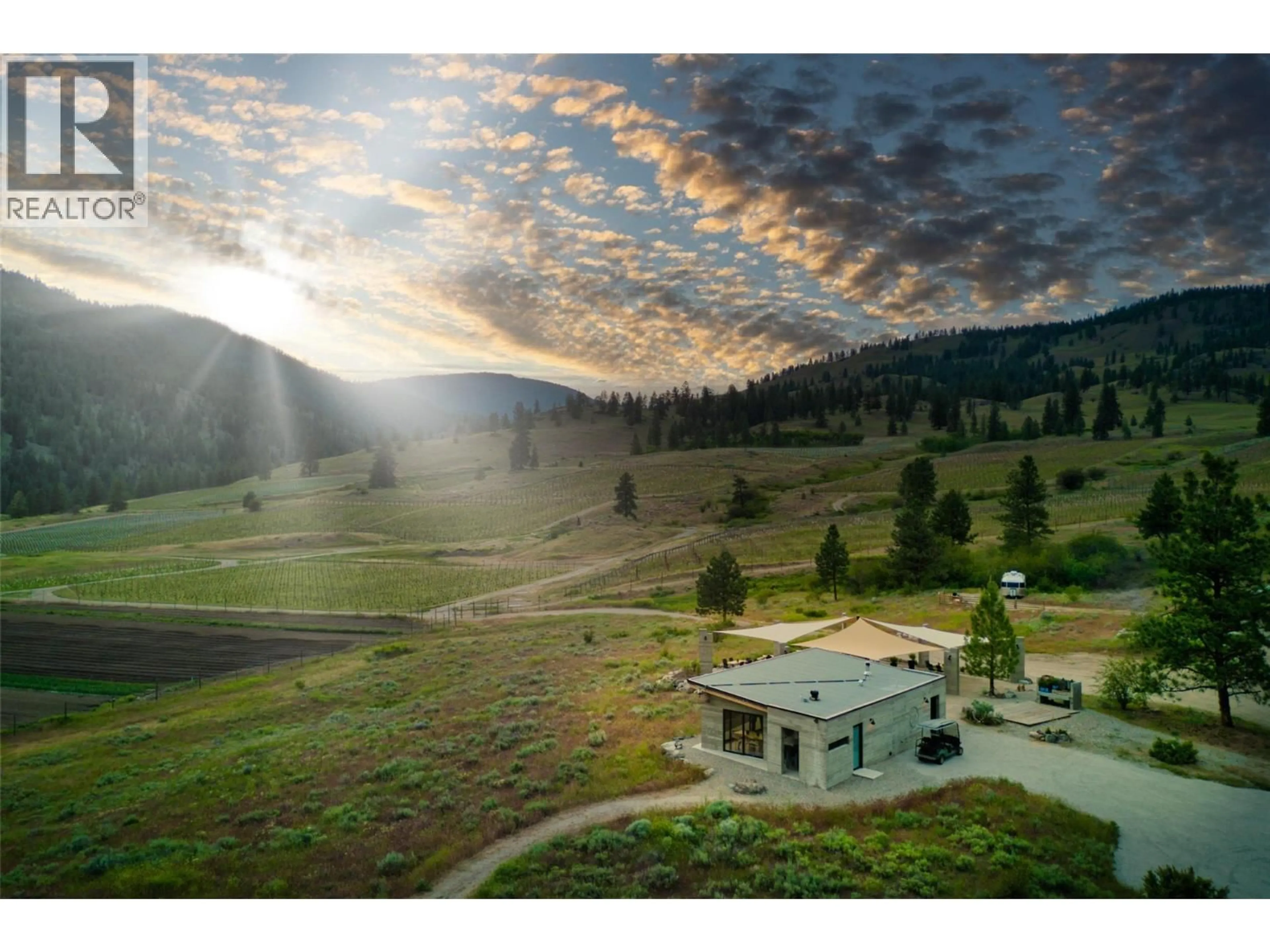 A pic from outside/outdoor area/front of a property/back of a property/a pic from drone, mountain view for 2110 LAWRENCE AVENUE, Penticton British Columbia V2A9G6