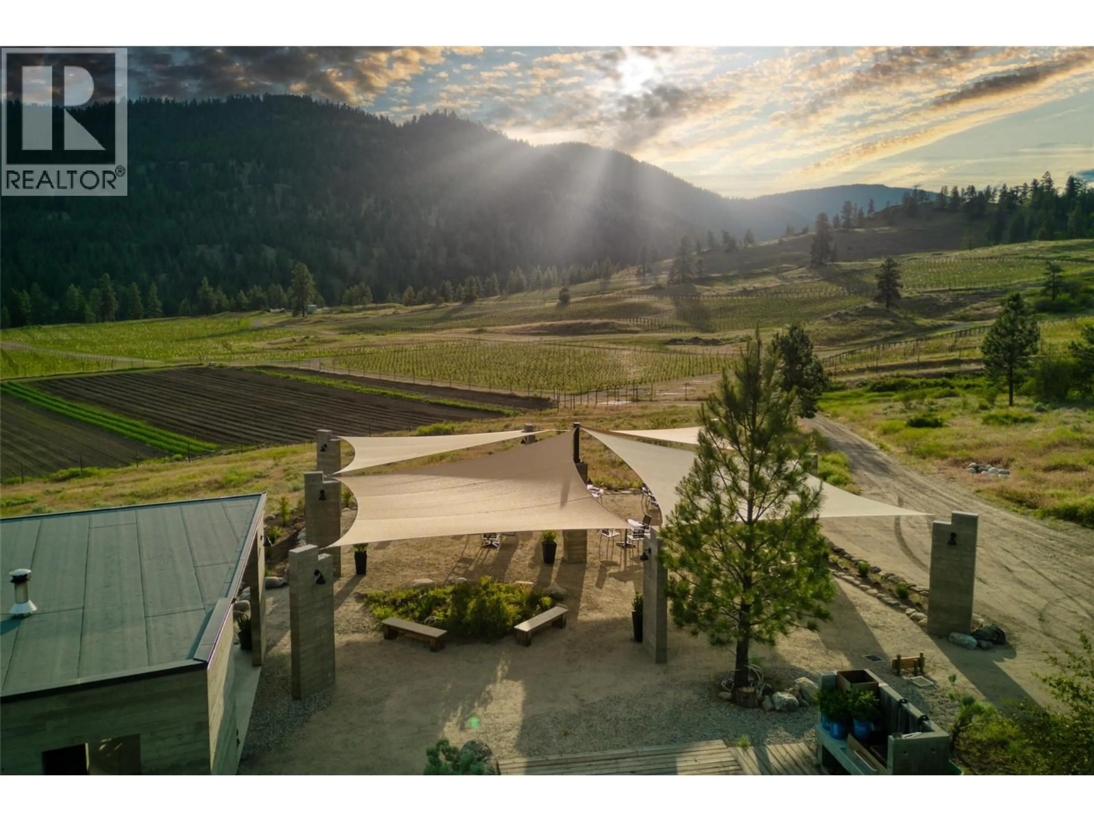A pic from outside/outdoor area/front of a property/back of a property/a pic from drone, mountain view for 2110 LAWRENCE AVENUE, Penticton British Columbia V2A9G6