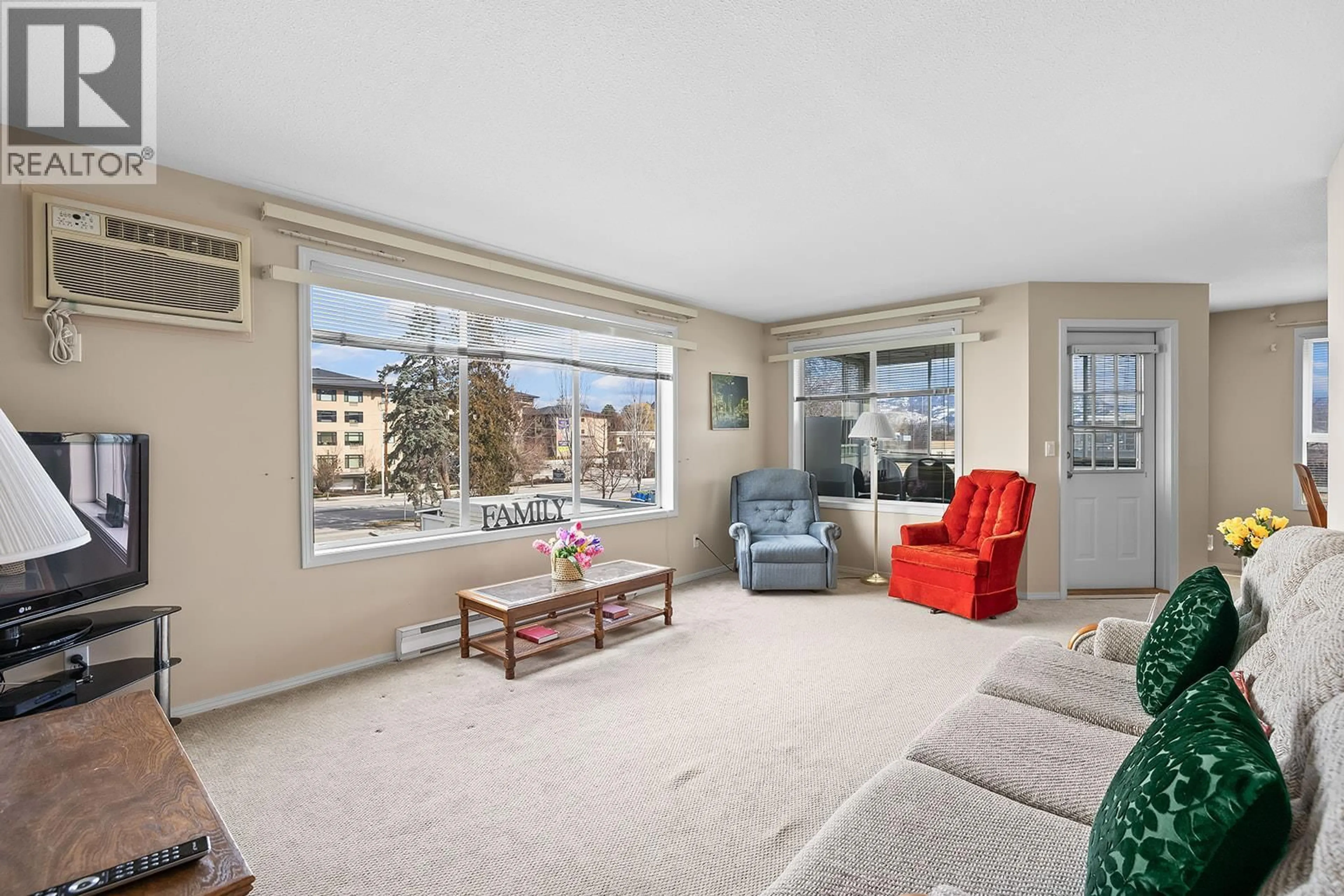 Living room with furniture, unknown for 305 - 1329 KLO ROAD, Kelowna British Columbia V1W3N9