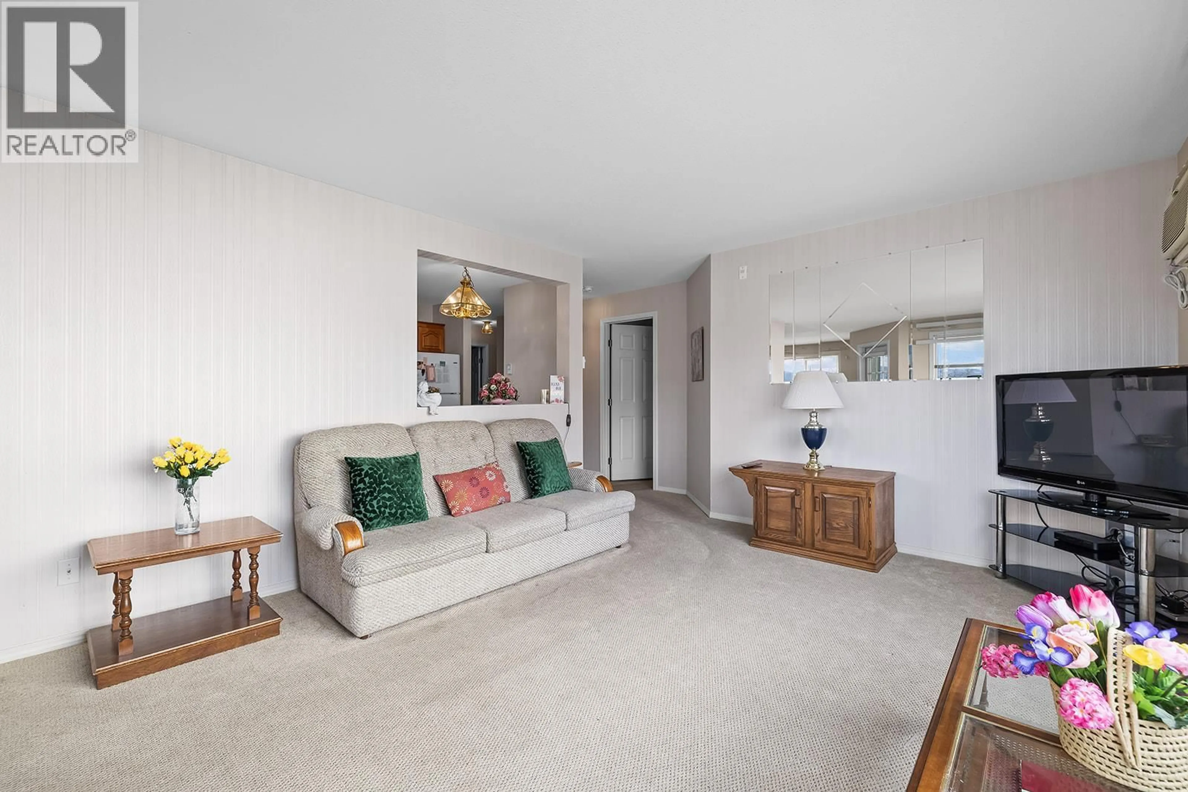 Living room with furniture, unknown for 305 - 1329 KLO ROAD, Kelowna British Columbia V1W3N9