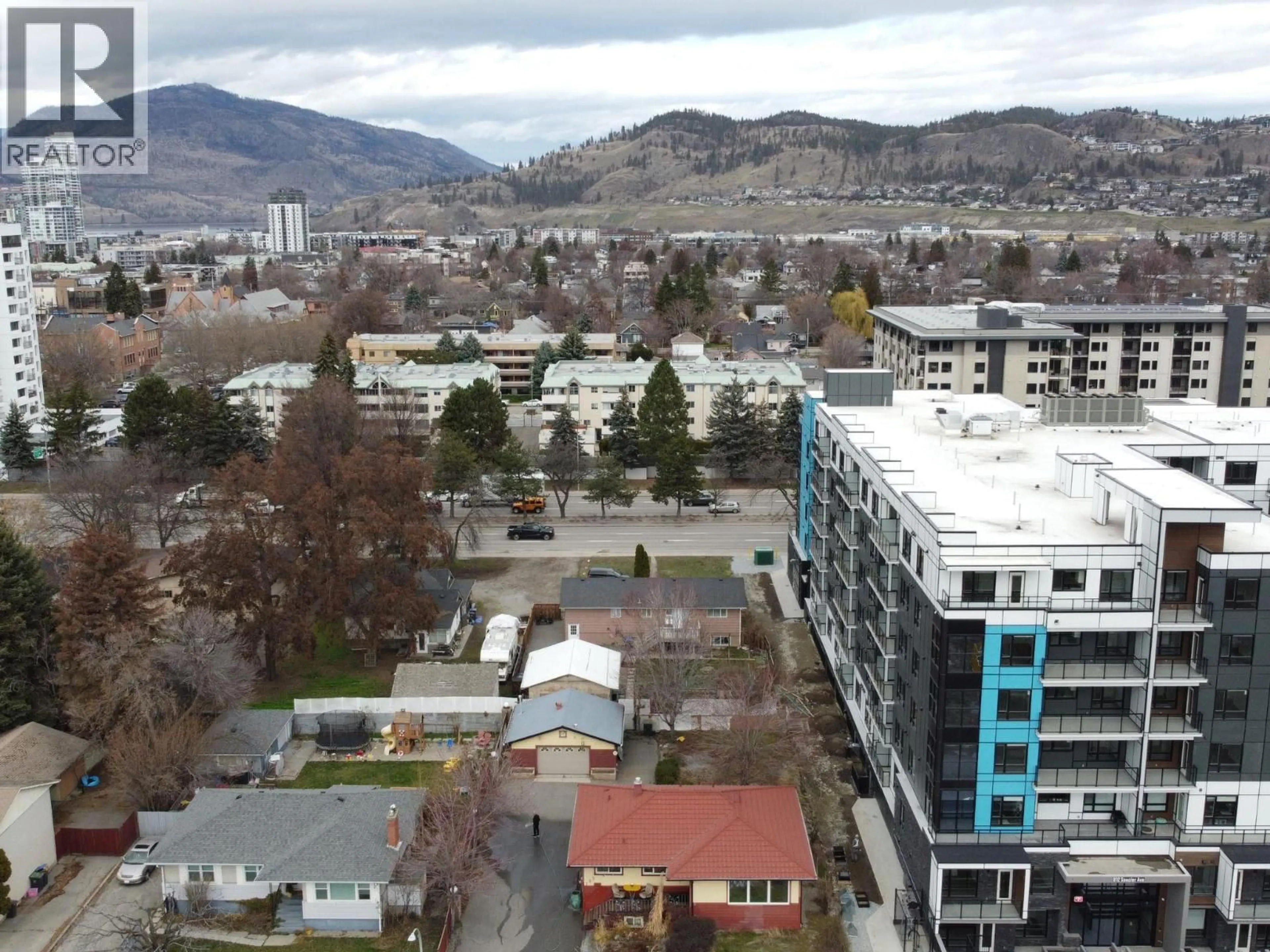 A pic from outside/outdoor area/front of a property/back of a property/a pic from drone, mountain view for 787-789 HARVEY AVENUE, Kelowna British Columbia V1Y6E2