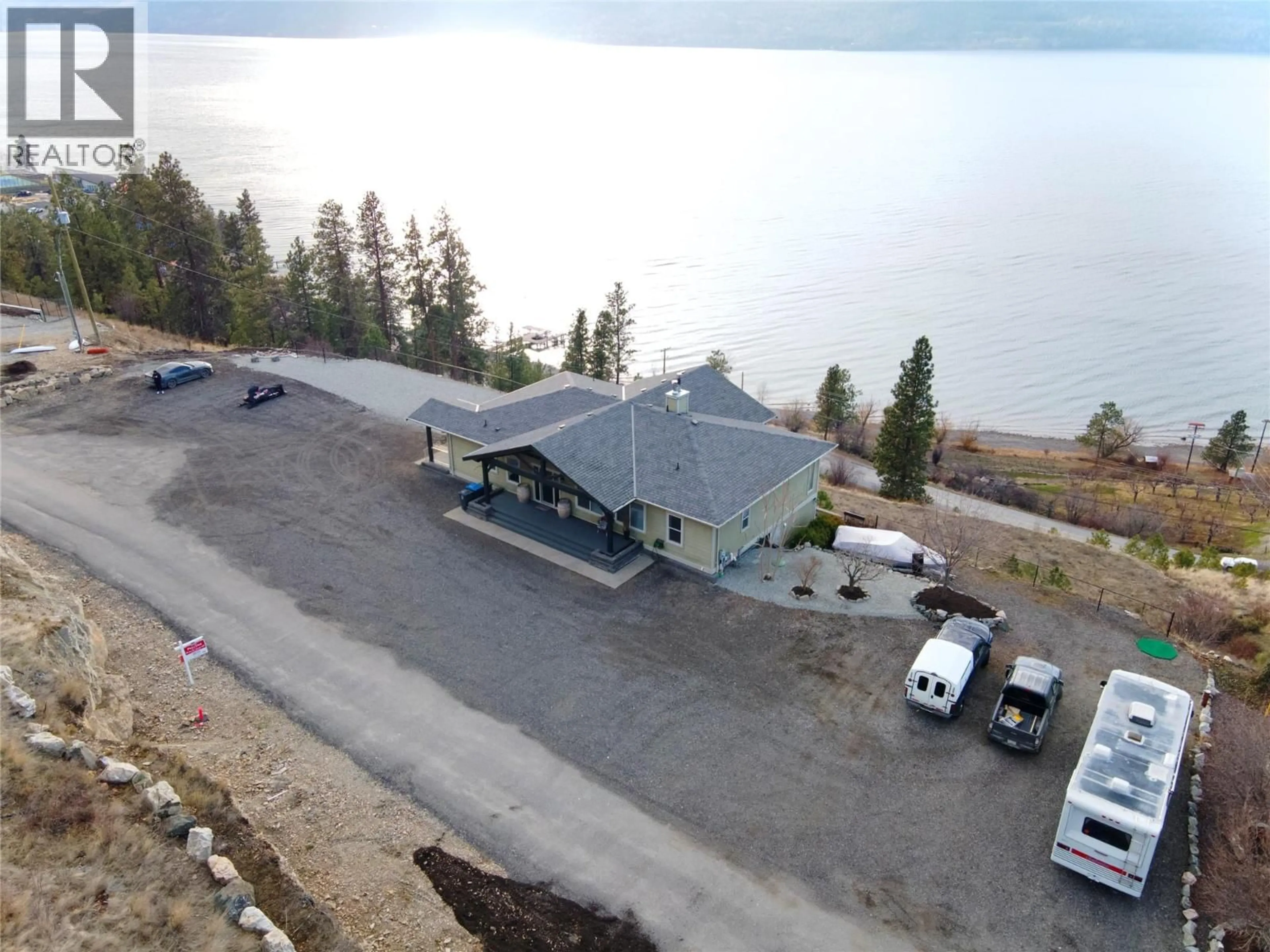 A pic from outside/outdoor area/front of a property/back of a property/a pic from drone, unknown for 13938 MOBERLY ROAD, Lake Country British Columbia V4V1A6