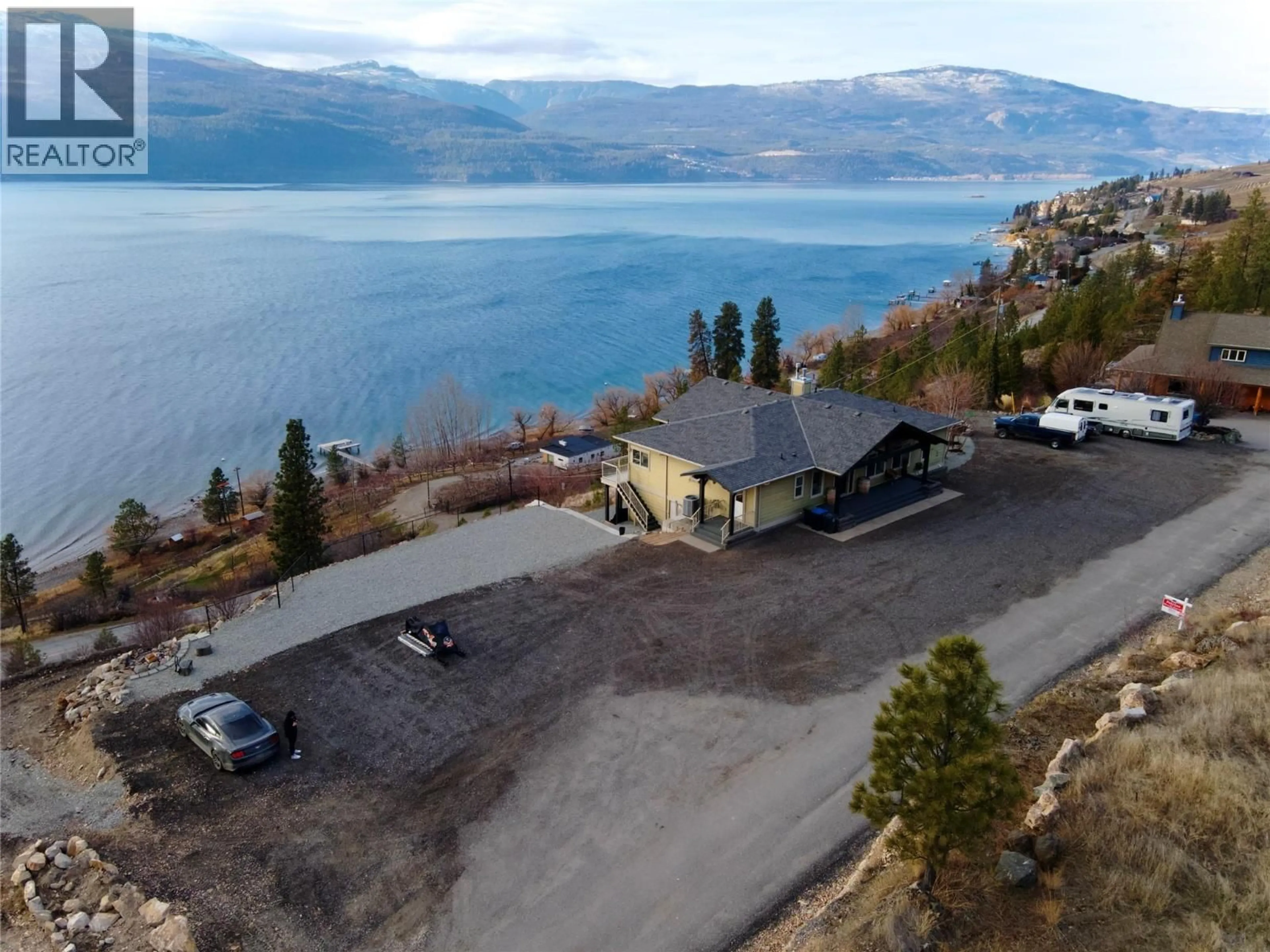 A pic from outside/outdoor area/front of a property/back of a property/a pic from drone, water/lake/river/ocean view for 13938 MOBERLY ROAD, Lake Country British Columbia V4V1A6