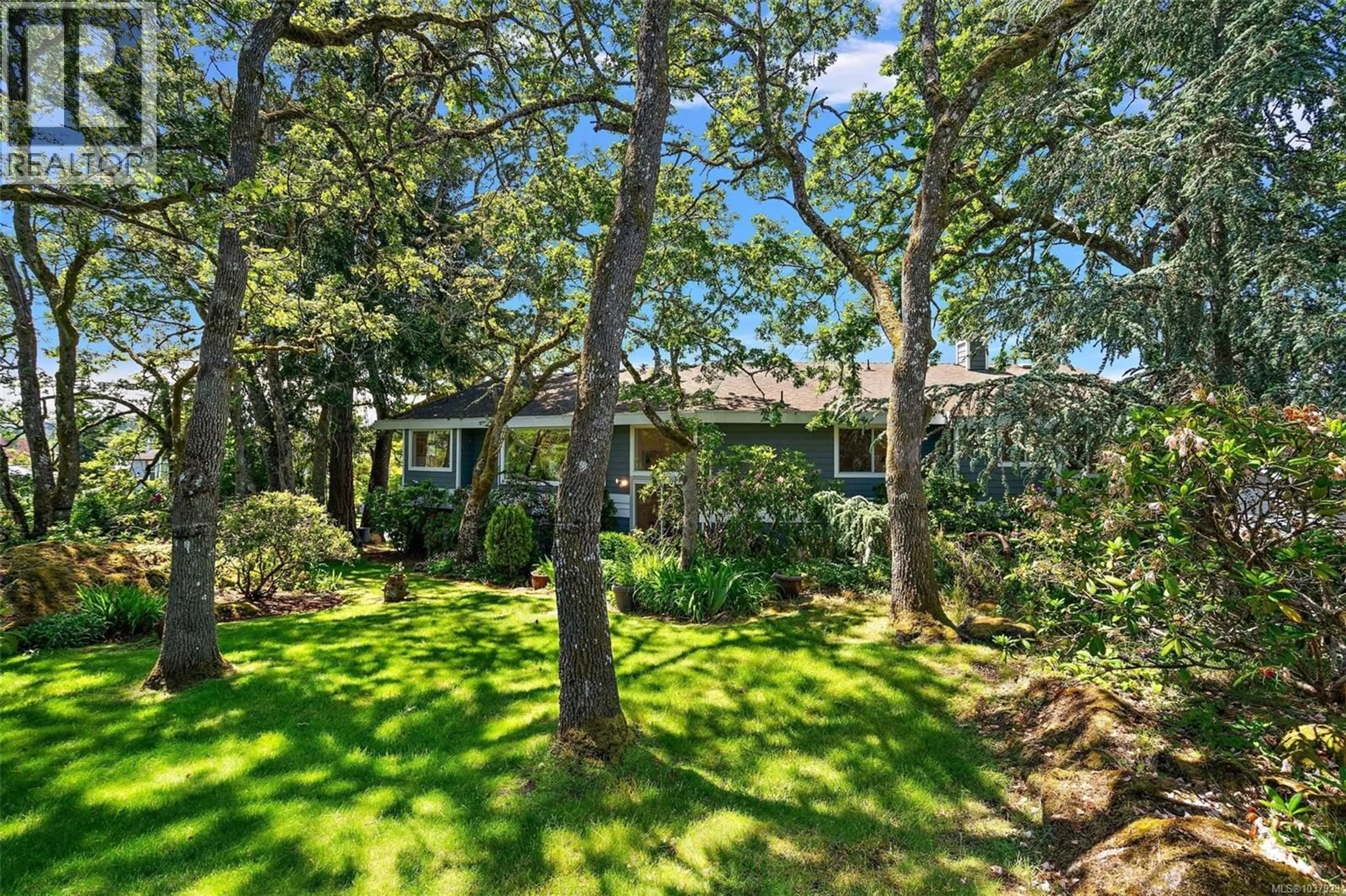 A pic from outside/outdoor area/front of a property/back of a property/a pic from drone, forest/trees view for 858 MALTWOOD TERRACE, Saanich British Columbia V8X5C7