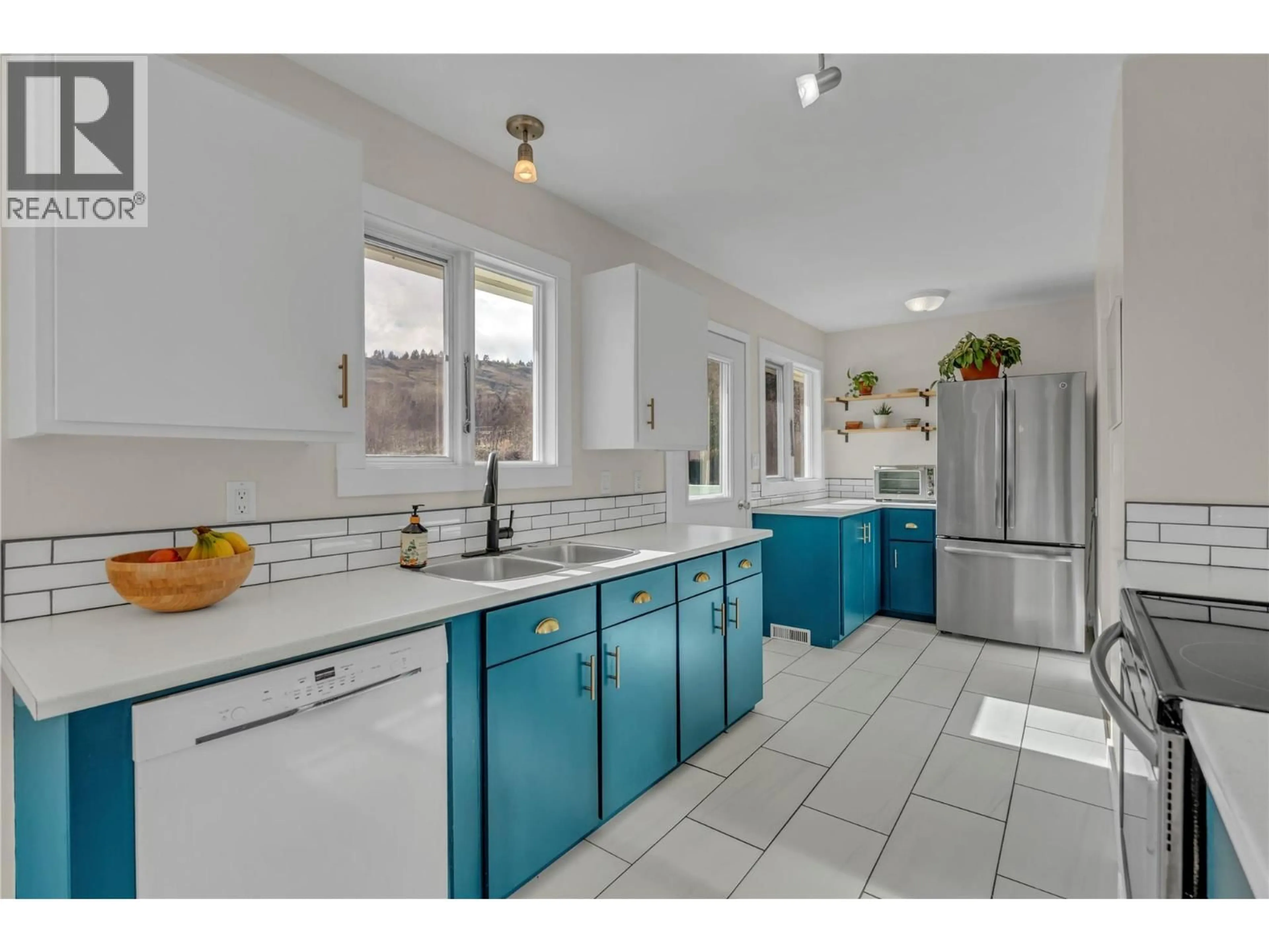 Open concept kitchen, ceramic/tile floor for 113 HEMLOCK AVENUE, Kaleden British Columbia V0H1K0