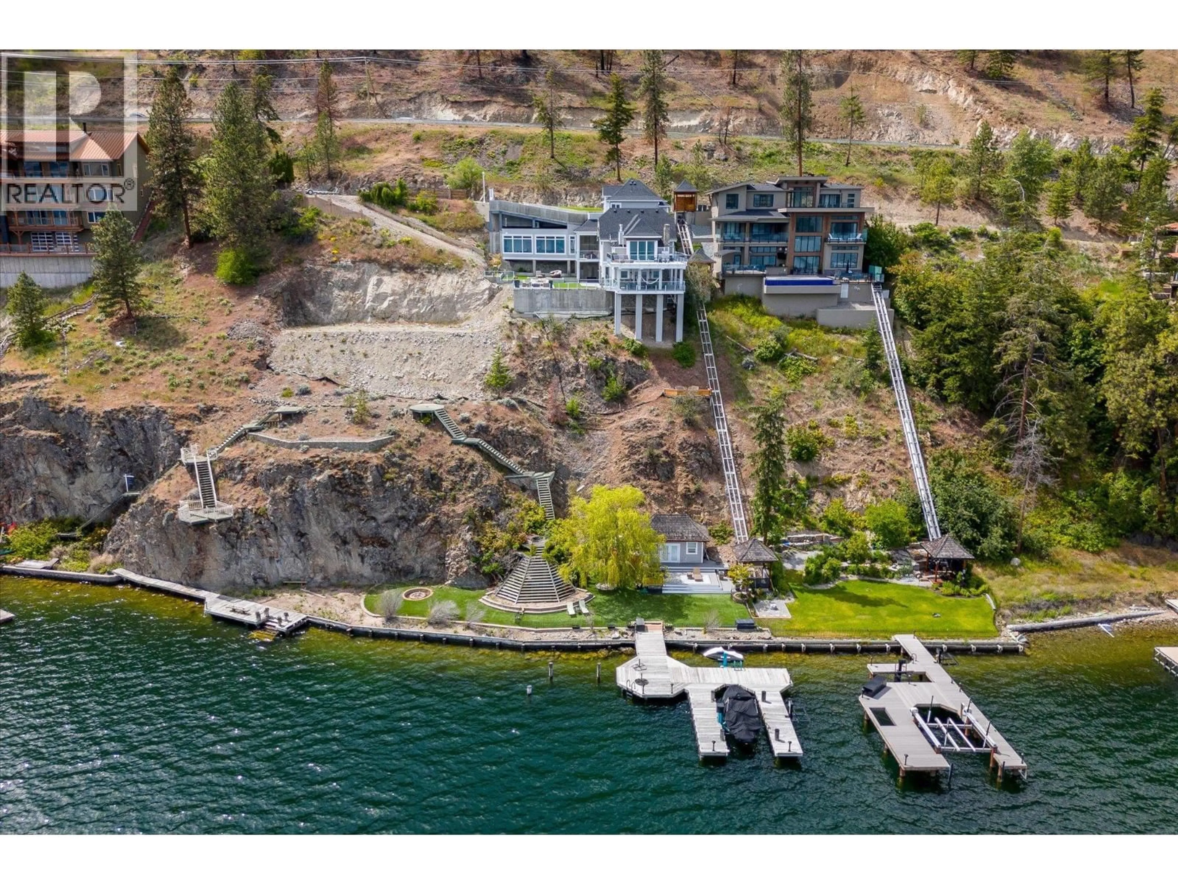 A pic from outside/outdoor area/front of a property/back of a property/a pic from drone, water/lake/river/ocean view for 22 - 901 WESTSIDE ROAD SOUTH, West Kelowna British Columbia V1Z3W9