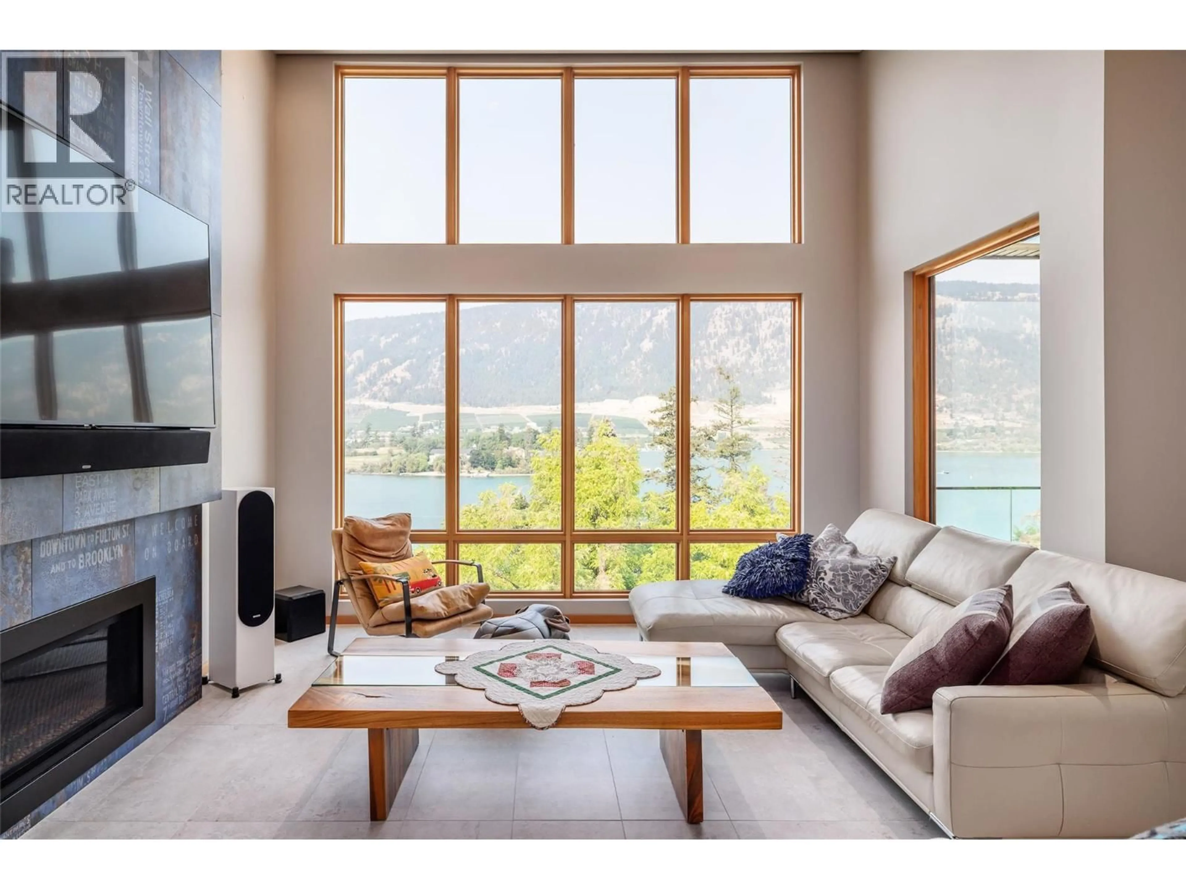 Living room with furniture, unknown for 15896 CLARIDGE DRIVE, Lake Country British Columbia V4V2T6