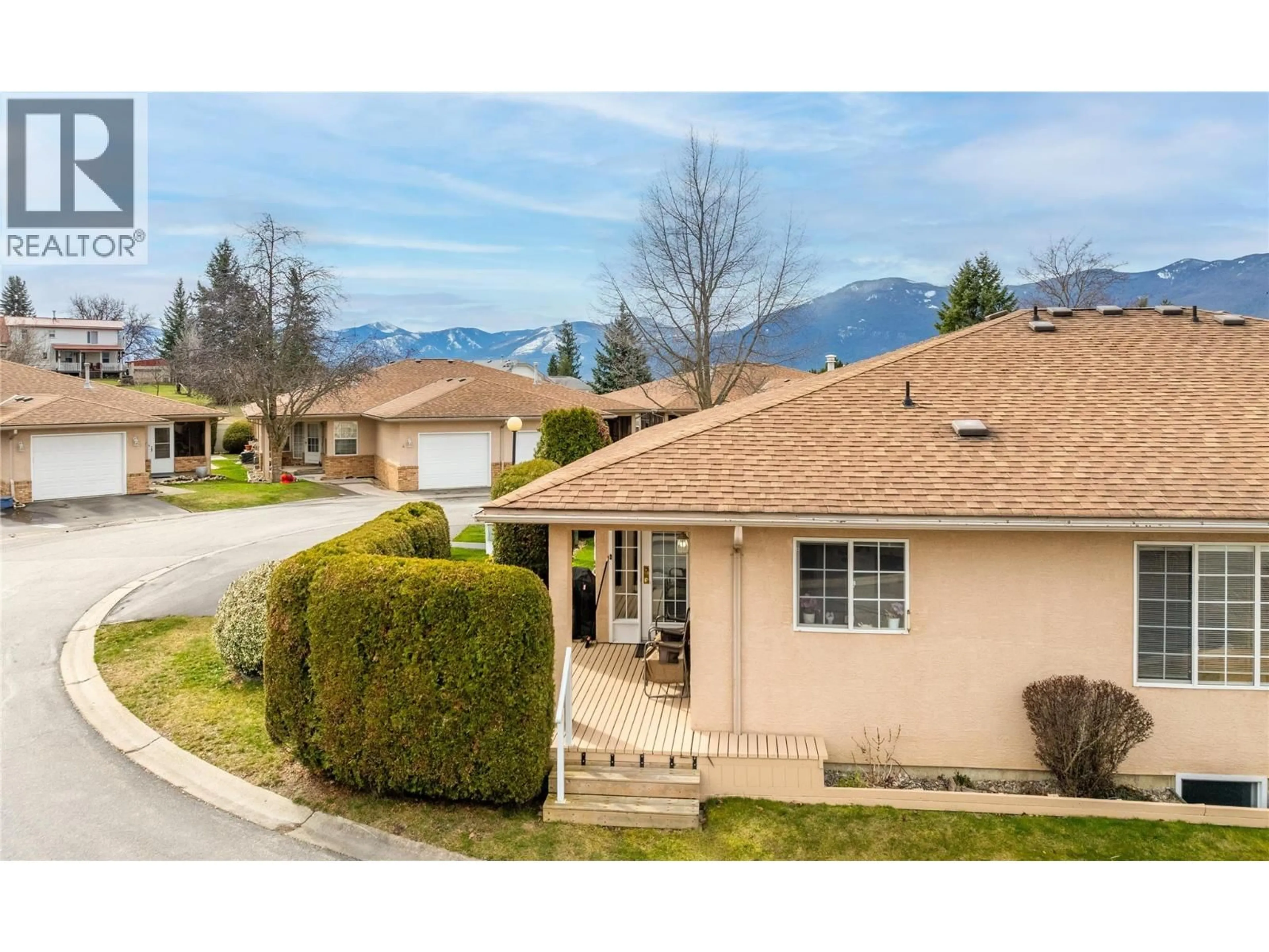 A pic from outside/outdoor area/front of a property/back of a property/a pic from drone, mountain view for 37 - 310 6TH AVENUE SOUTH, Creston British Columbia V0B1G3