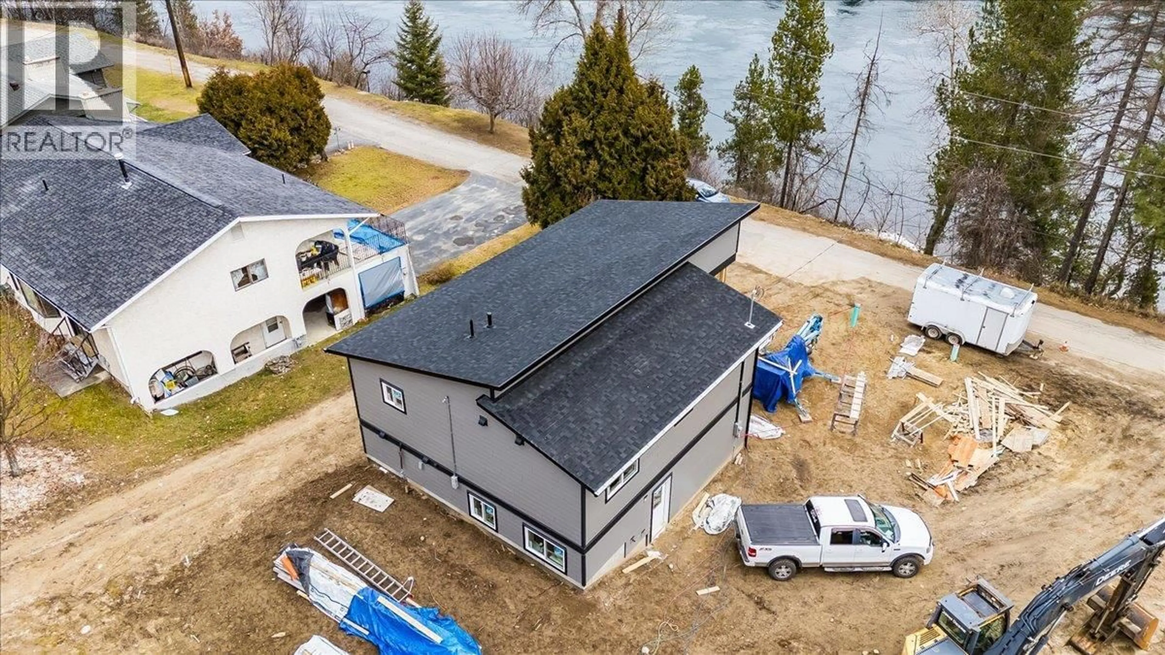 A pic from outside/outdoor area/front of a property/back of a property/a pic from drone, water/lake/river/ocean view for 2808 1ST AVENUE, Castlegar British Columbia V1N2R2