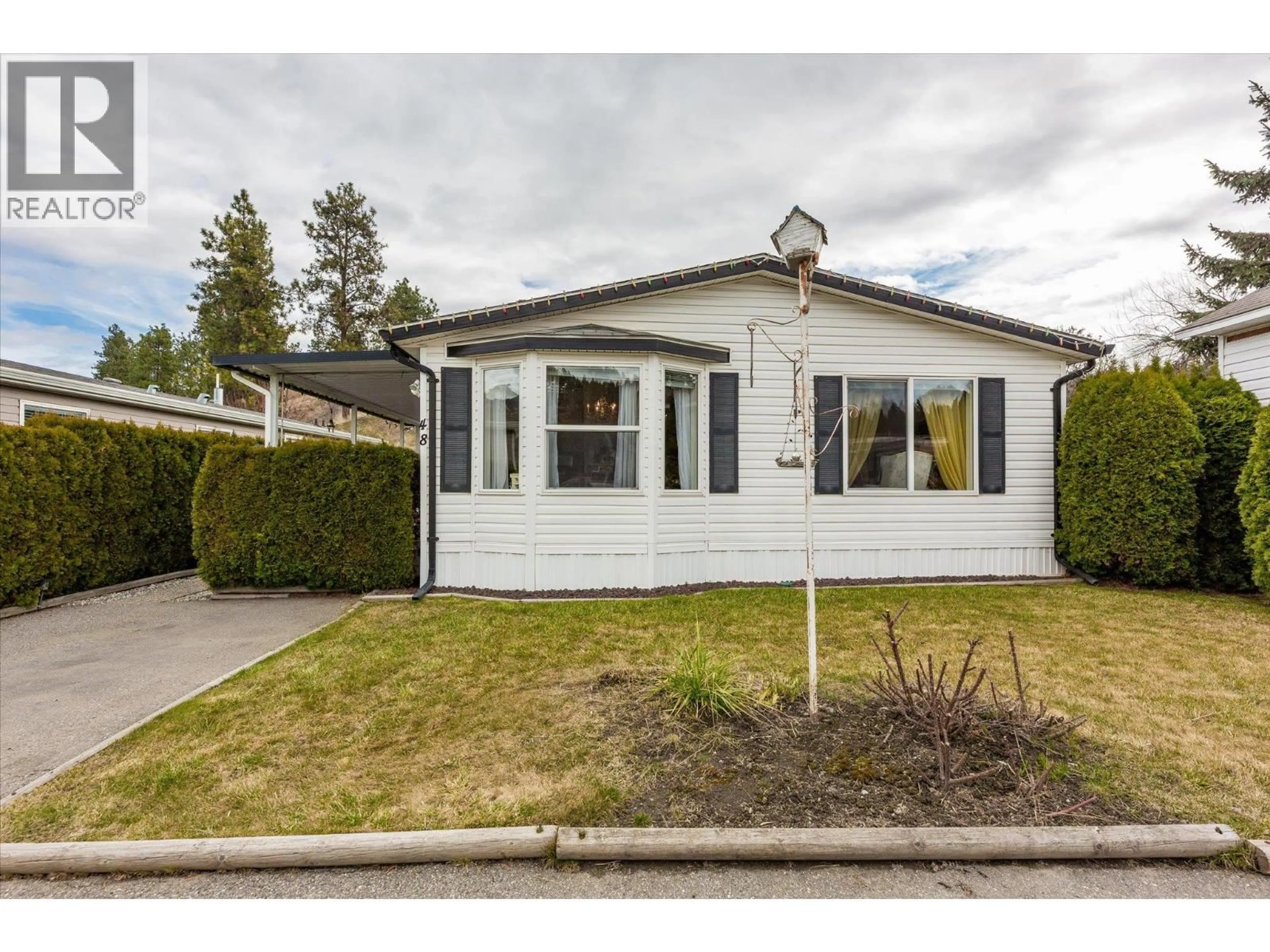 Home with vinyl exterior material, street for 48 - 610 KATHERINE ROAD, West Kelowna British Columbia V1Z3G2