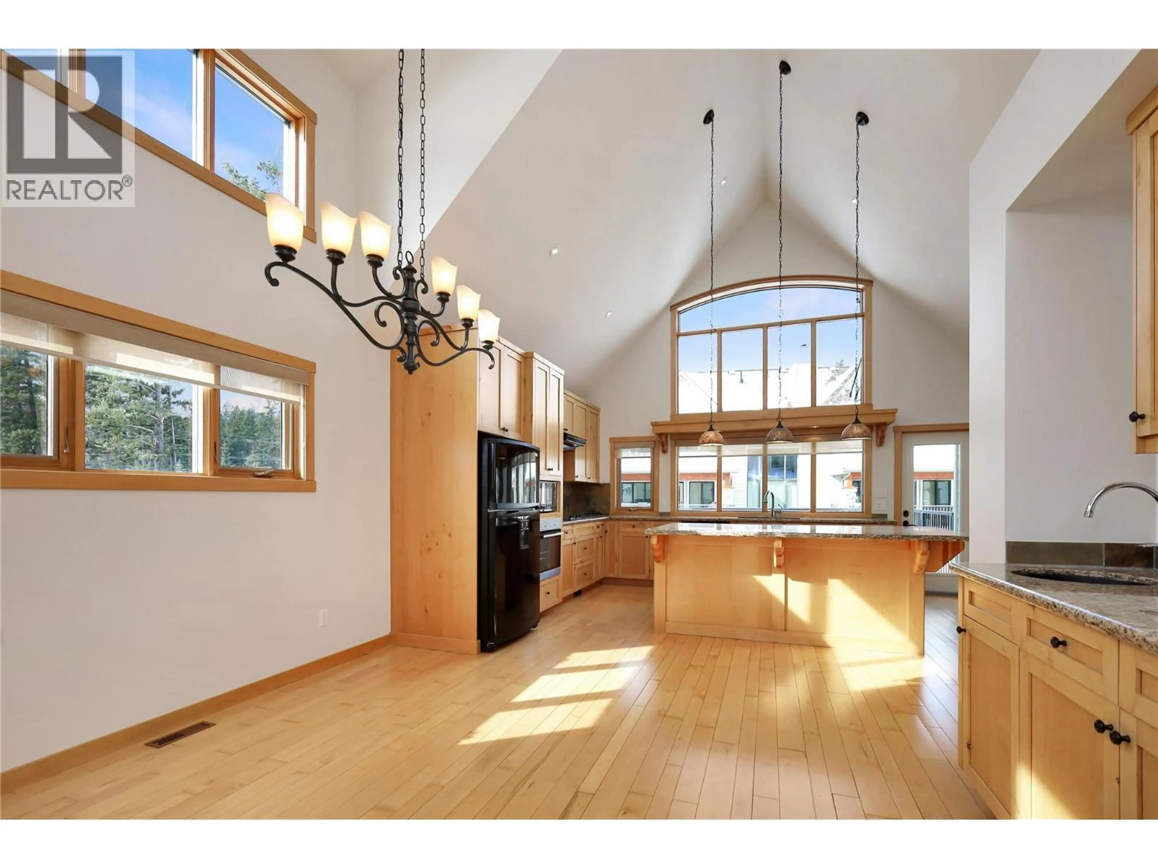 Open concept kitchen, wood/laminate floor for 21 - 6800 COLUMBIA LAKE ROAD, Fairmont Hot Springs British Columbia V0B1L2