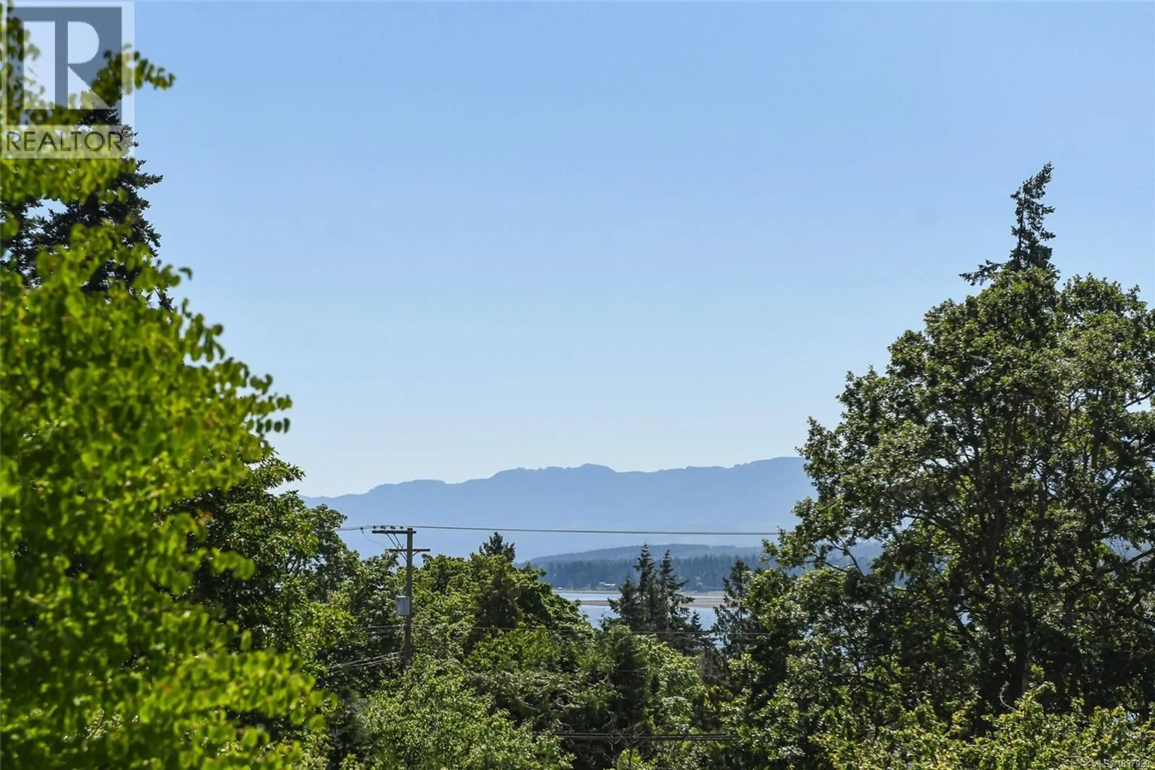 A pic from outside/outdoor area/front of a property/back of a property/a pic from drone, water/lake/river/ocean view for 1 - 2030 WALLACE AVENUE, Comox British Columbia V9M1X3
