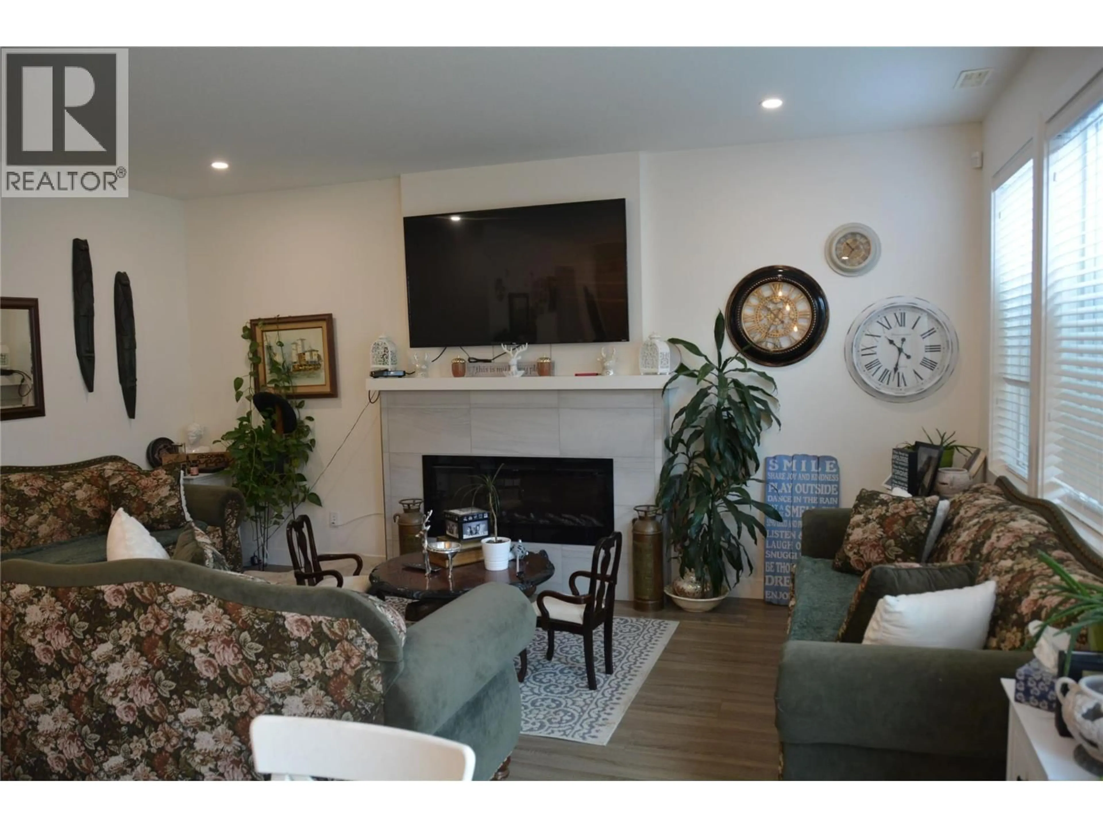 Living room with furniture, wood/laminate floor for 30 - 1900 ORD ROAD, Kamloops British Columbia V2B0B6