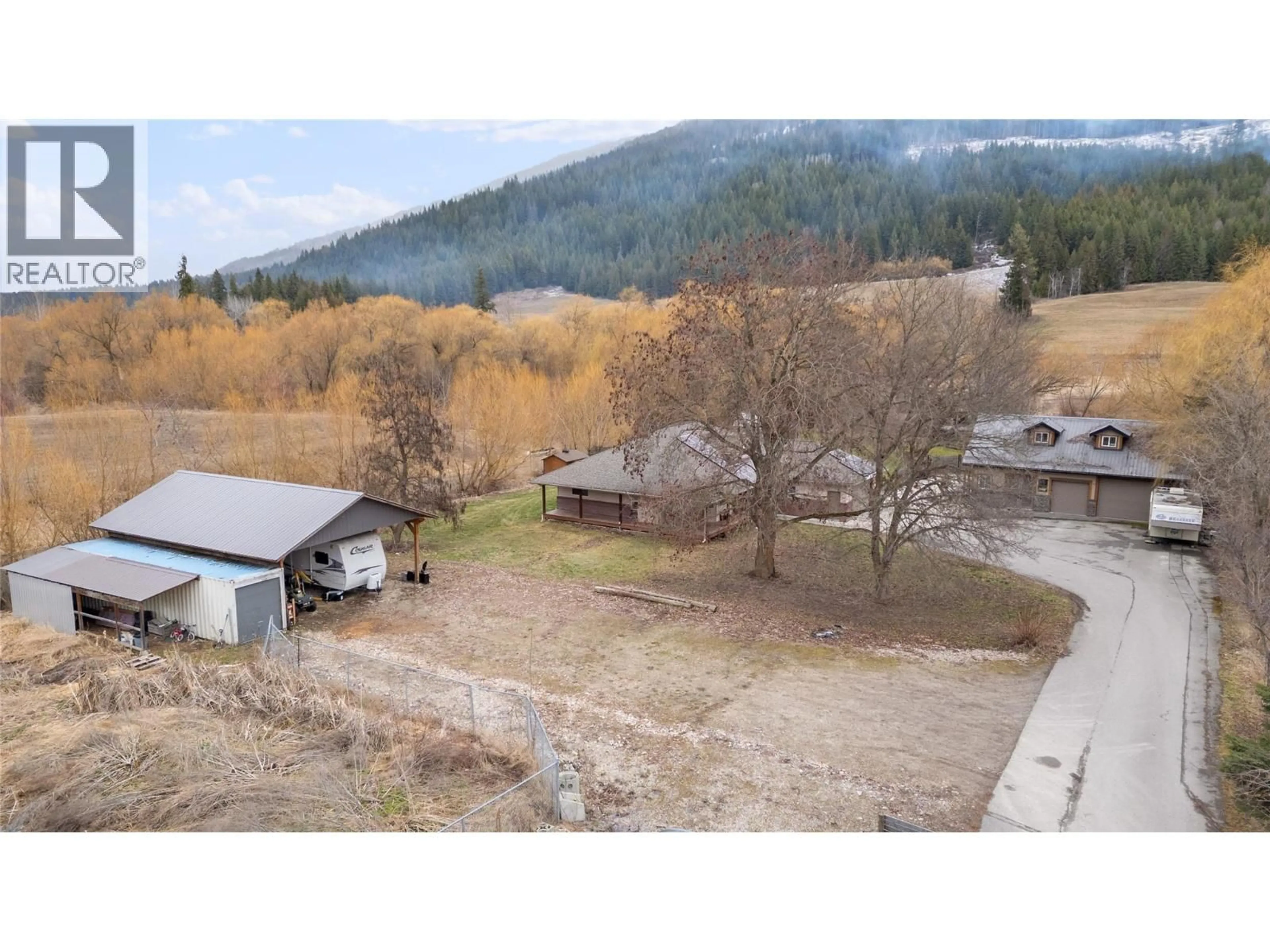 A pic from outside/outdoor area/front of a property/back of a property/a pic from drone, mountain view for 3960 50 STREET NORTHEAST, Salmon Arm British Columbia V1E1Y5