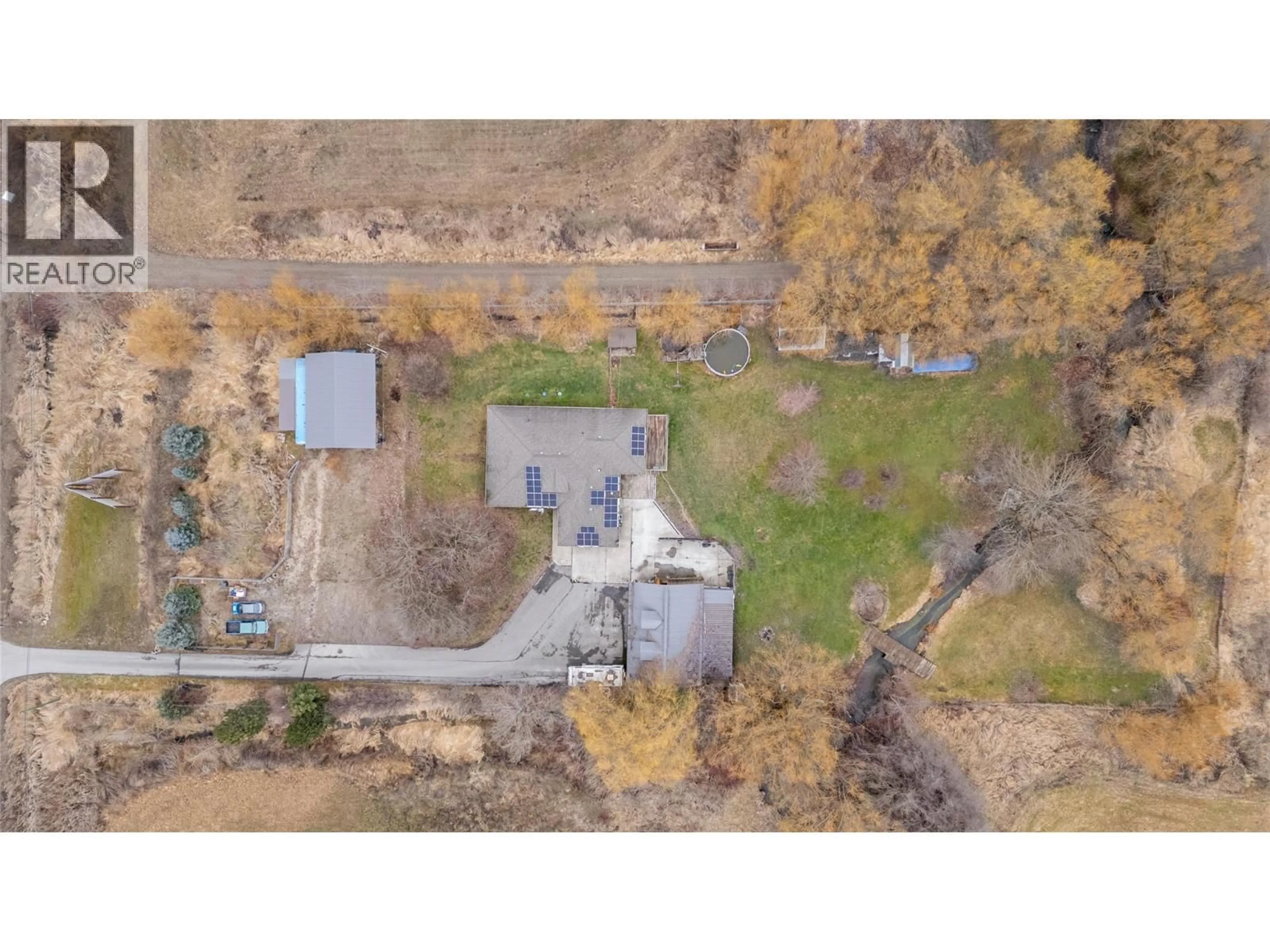 A pic from outside/outdoor area/front of a property/back of a property/a pic from drone, street for 3960 50 STREET NORTHEAST, Salmon Arm British Columbia V1E1Y5