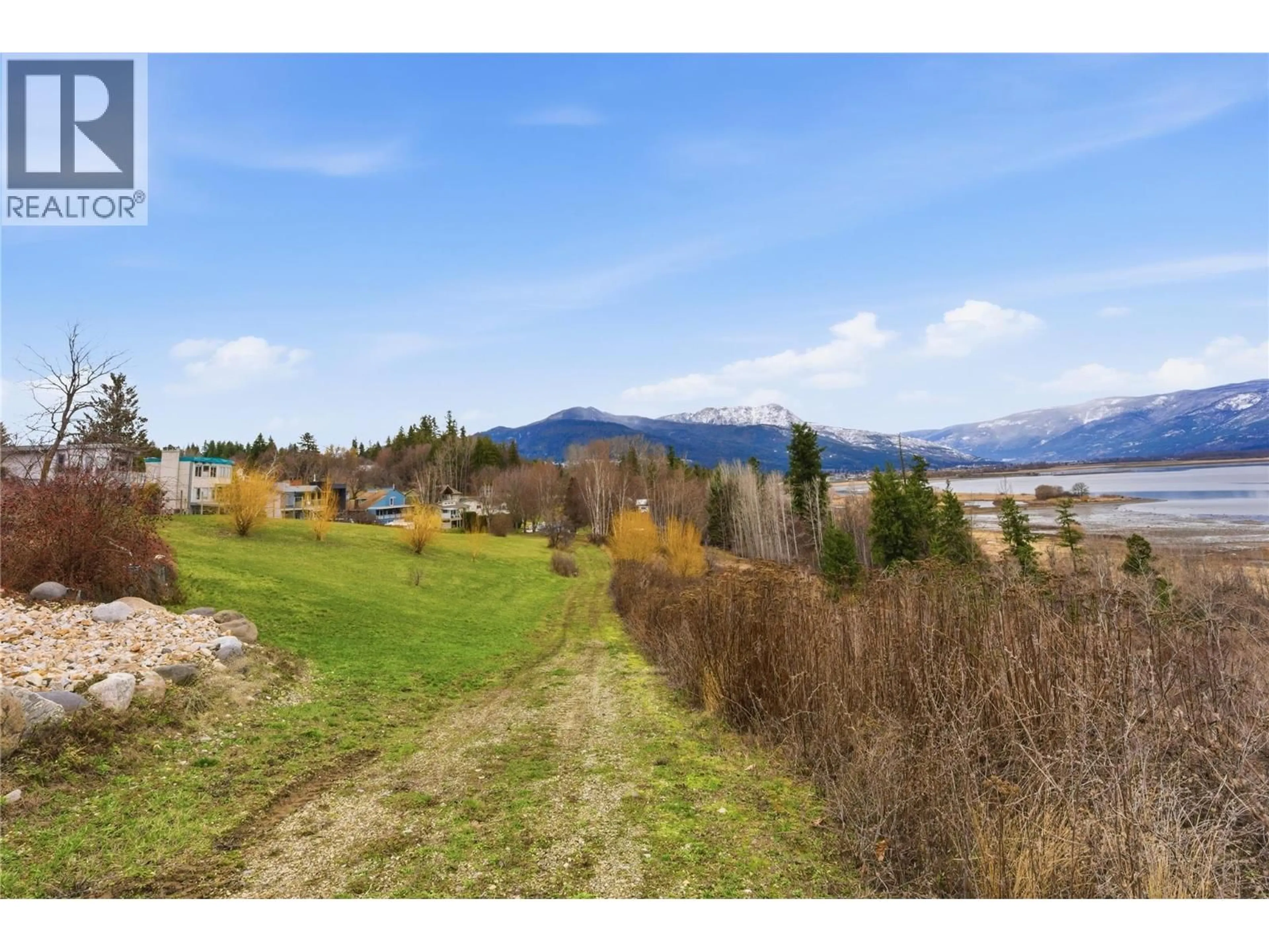 A pic from outside/outdoor area/front of a property/back of a property/a pic from drone, water/lake/river/ocean view for 1660 28 AVENUE NORTHEAST, Salmon Arm British Columbia V1E3X2