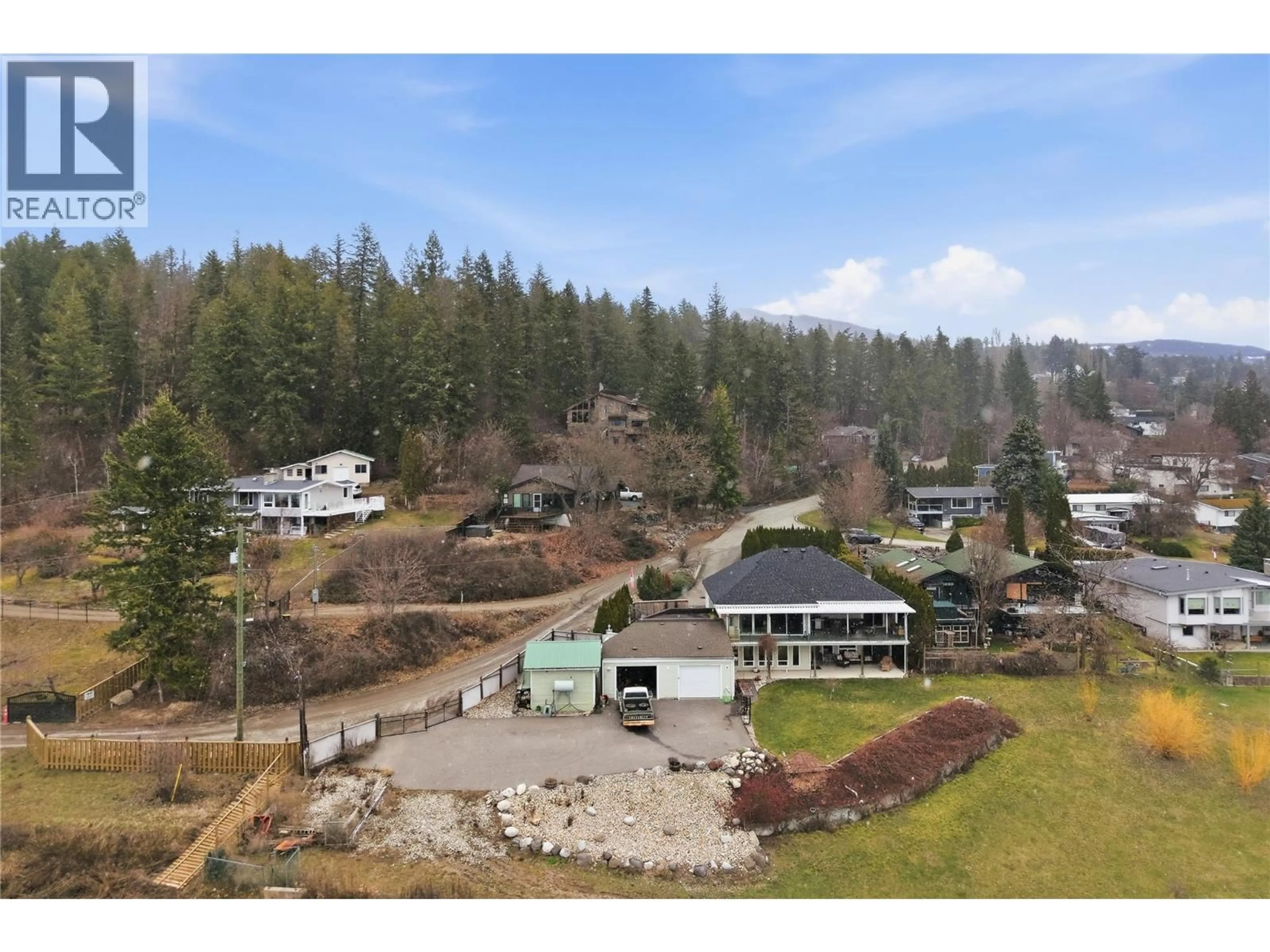 A pic from outside/outdoor area/front of a property/back of a property/a pic from drone, water/lake/river/ocean view for 1660 28 AVENUE NORTHEAST, Salmon Arm British Columbia V1E3X2