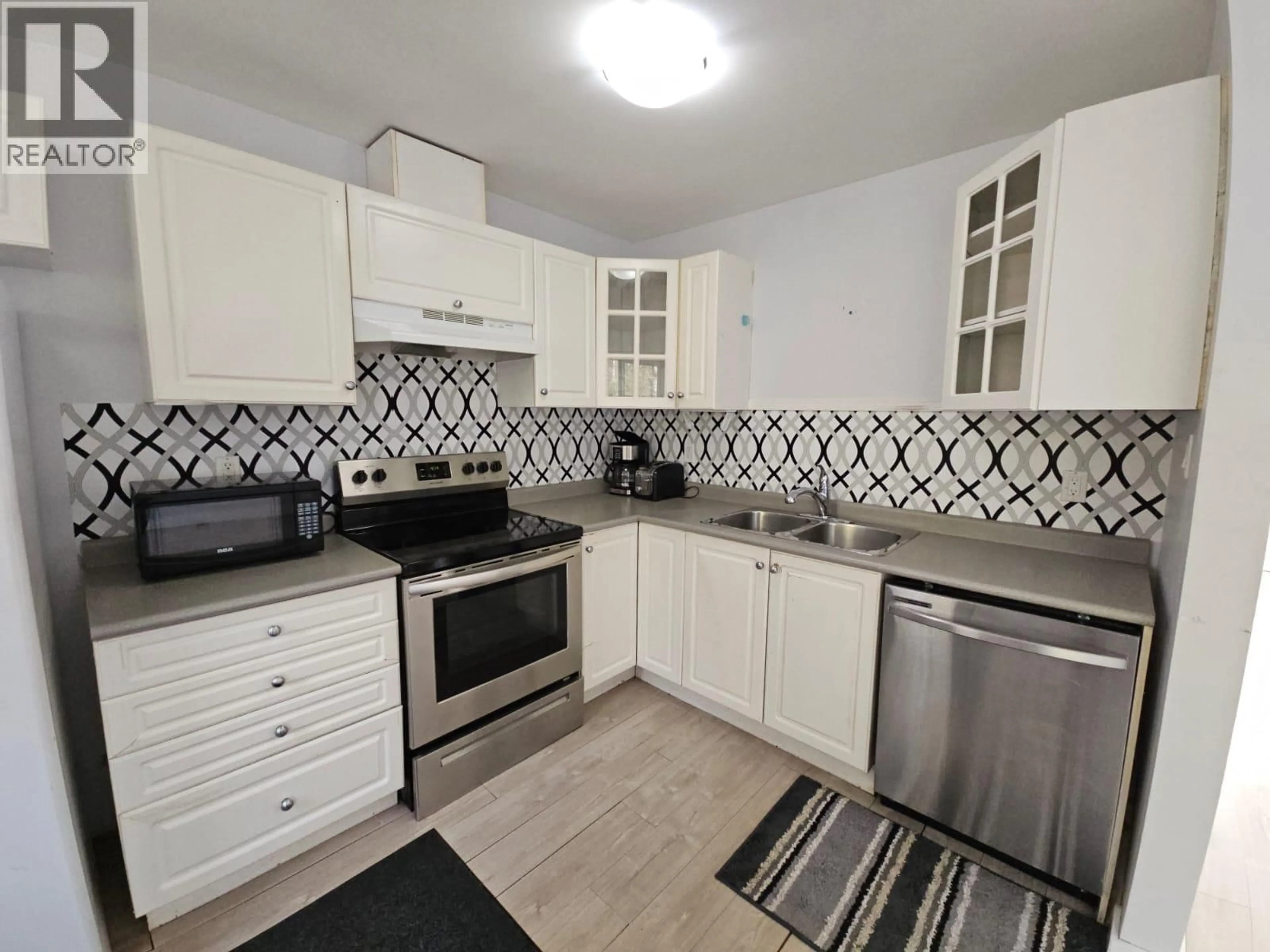 Standard kitchen, ceramic/tile floor for 140-5100 53 STREET SW OTHER, Chetwynd British Columbia V0C1J0