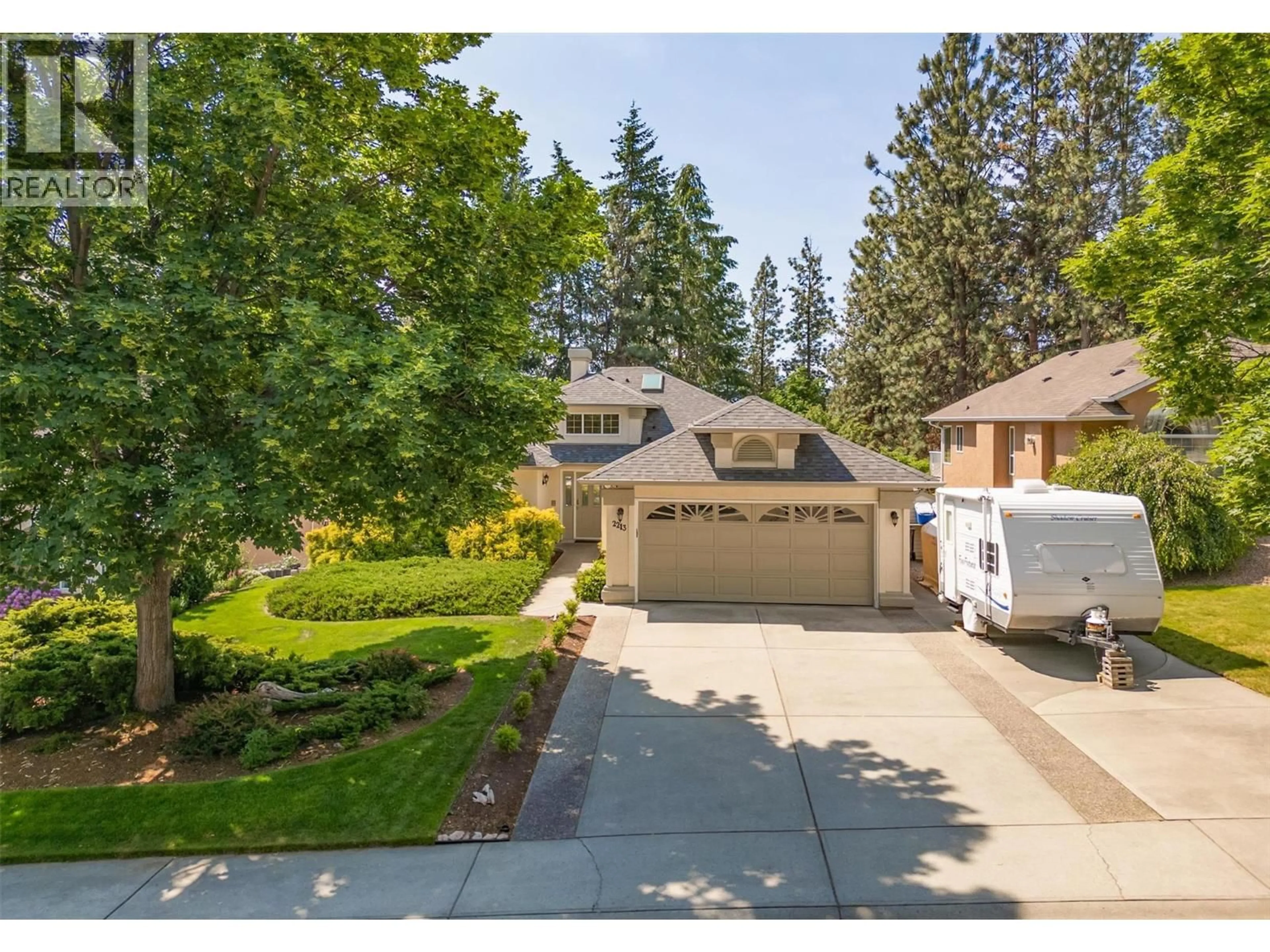 A pic from outside/outdoor area/front of a property/back of a property/a pic from drone, street for 2213 SHANNON WOODS PLACE, West Kelowna British Columbia V4T2L9