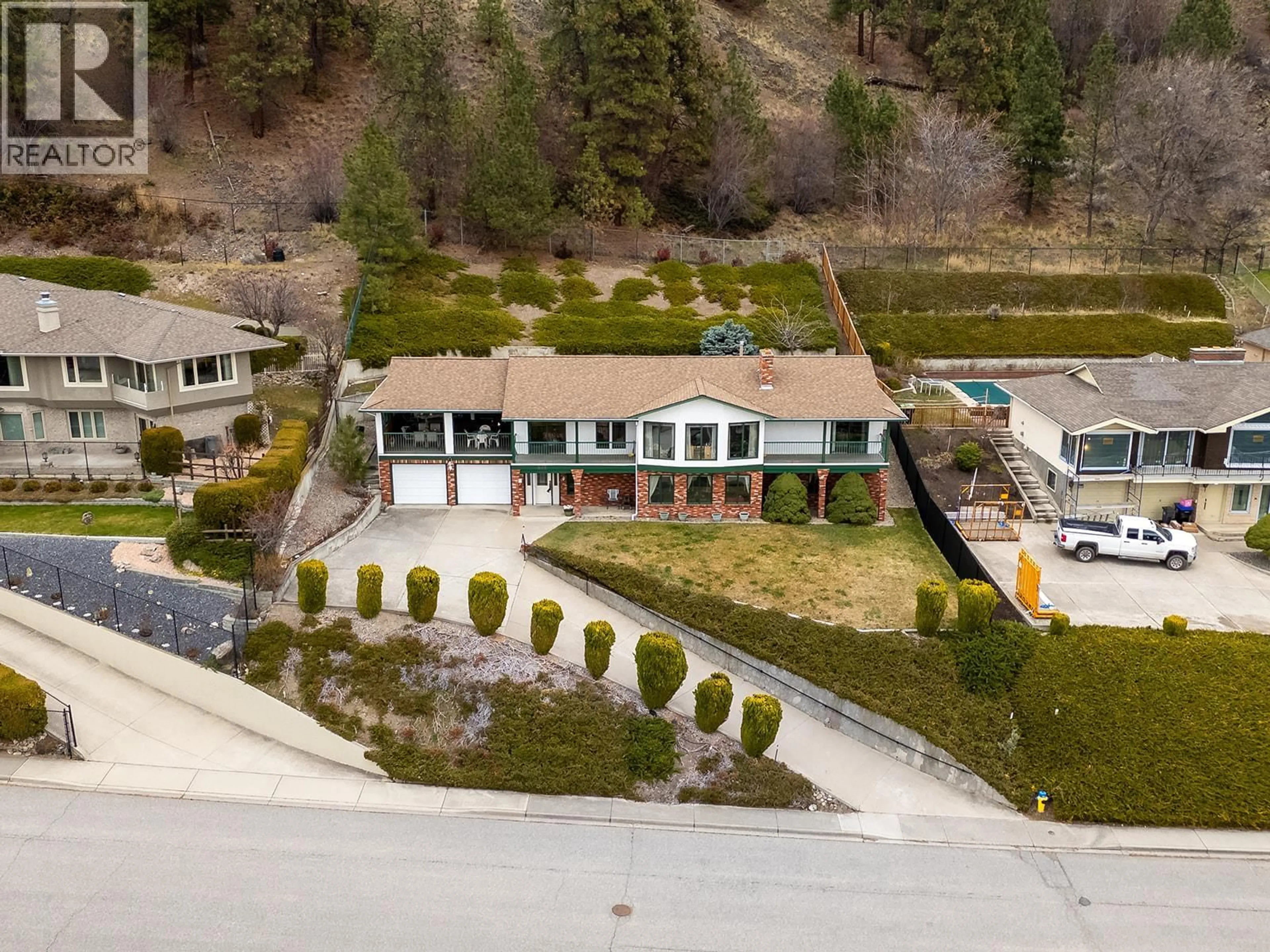A pic from outside/outdoor area/front of a property/back of a property/a pic from drone, unknown for 845 MOUNT ROYAL DRIVE, Kelowna British Columbia V1Y3M3
