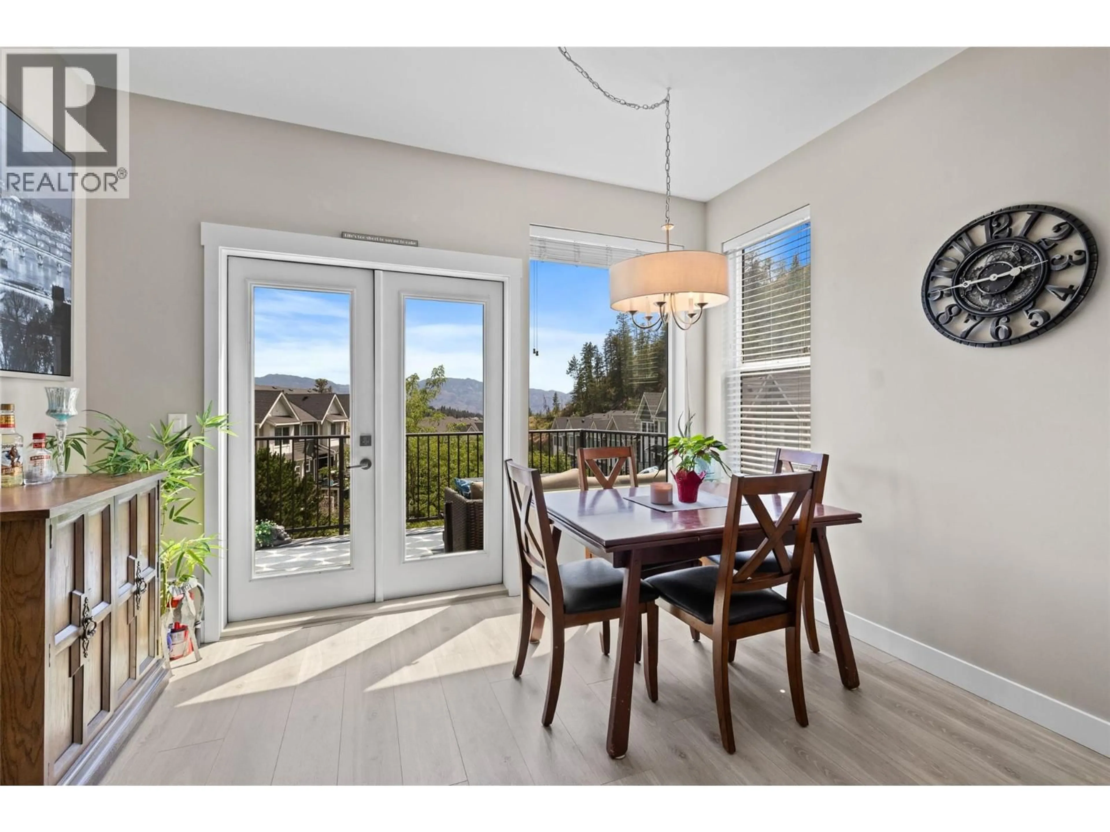 Dining room, wood/laminate floor for 61 - 2490 TUSCANY DRIVE, West Kelowna British Columbia V4T3M4
