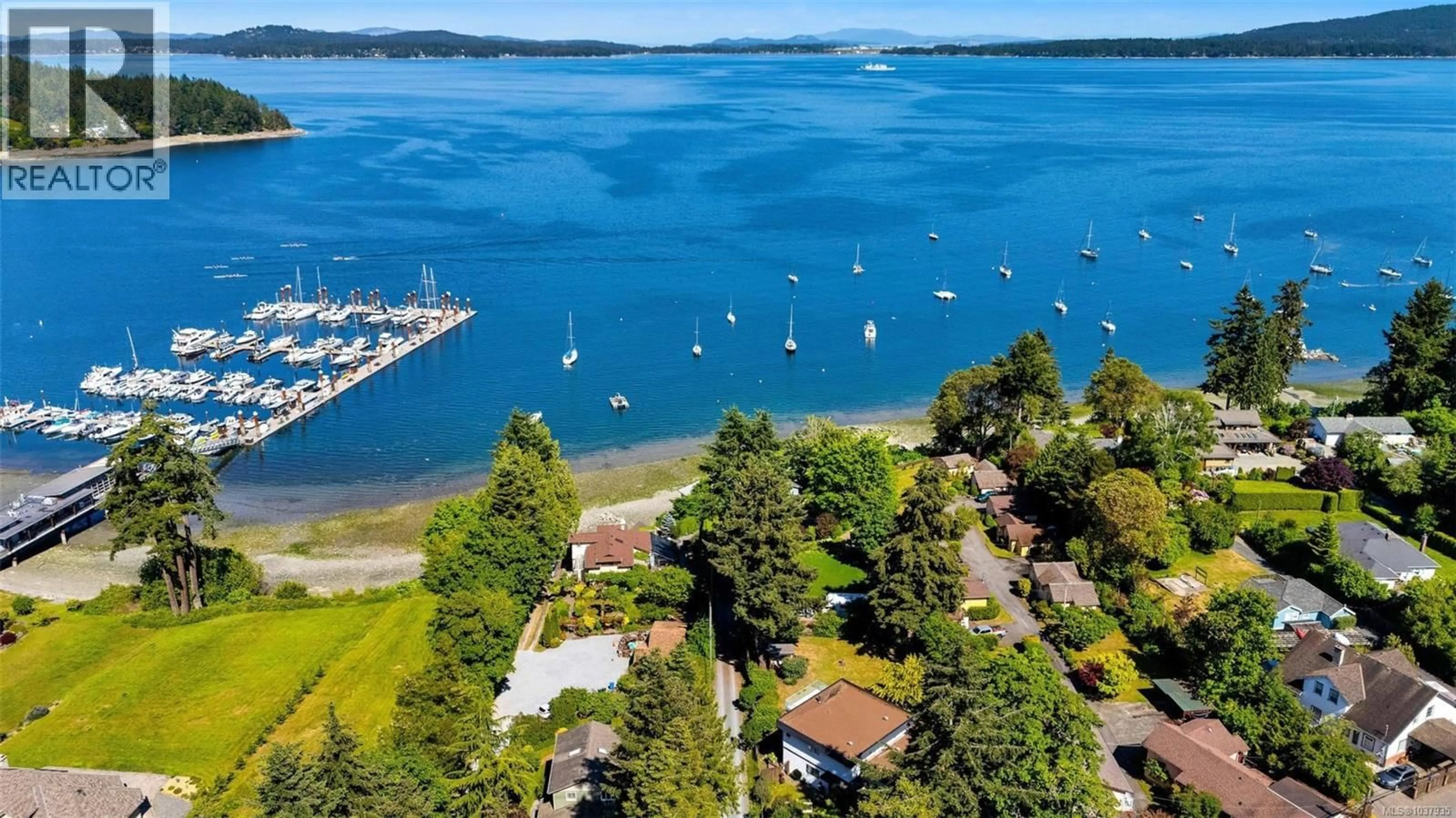 A pic from outside/outdoor area/front of a property/back of a property/a pic from drone, water/lake/river/ocean view for 2635 MILL BAY ROAD, Mill Bay British Columbia V8H1C9