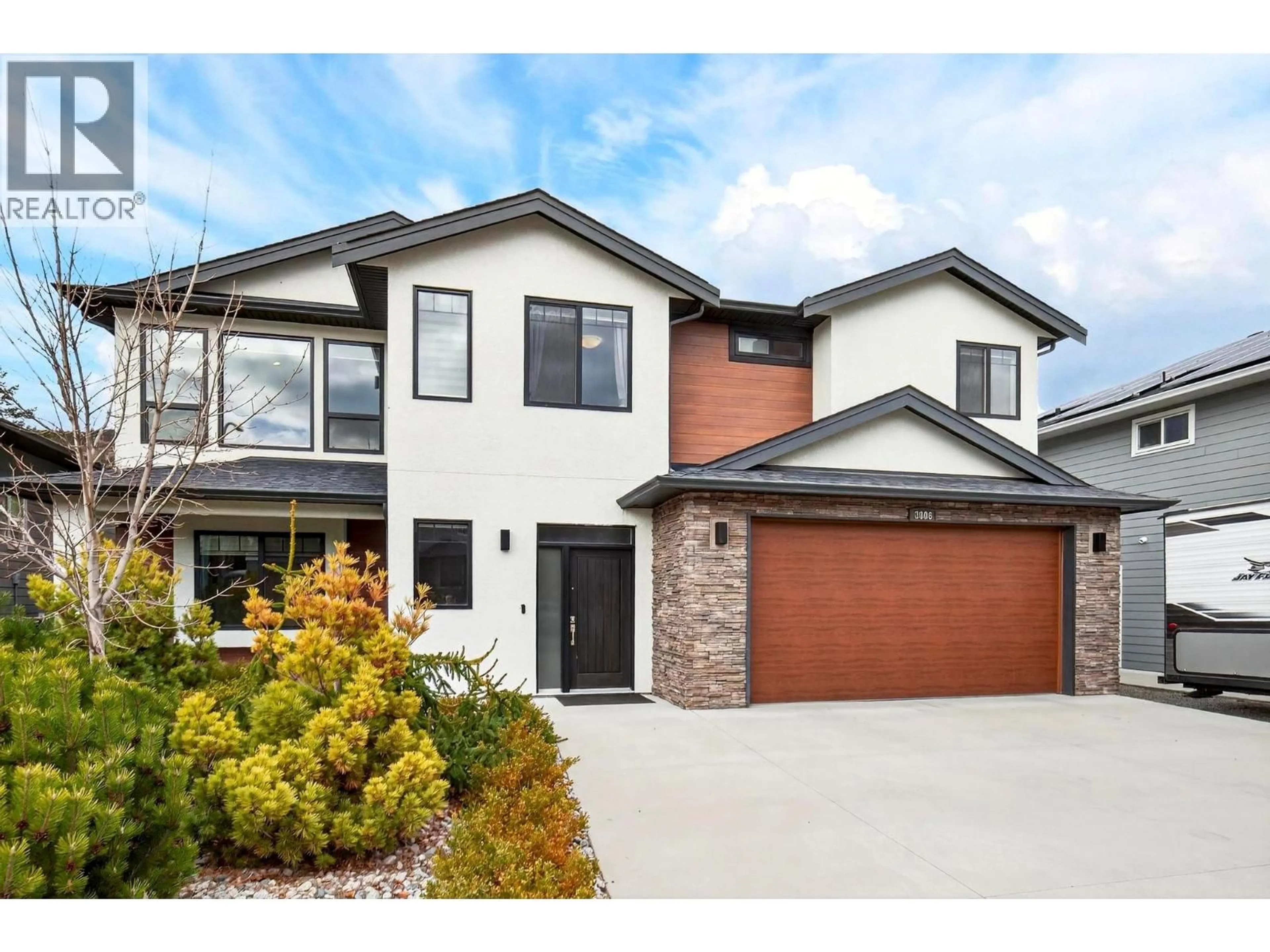 Home with brick exterior material, street for 3006 IRONRIDGE PLACE, West Kelowna British Columbia V4T3L5