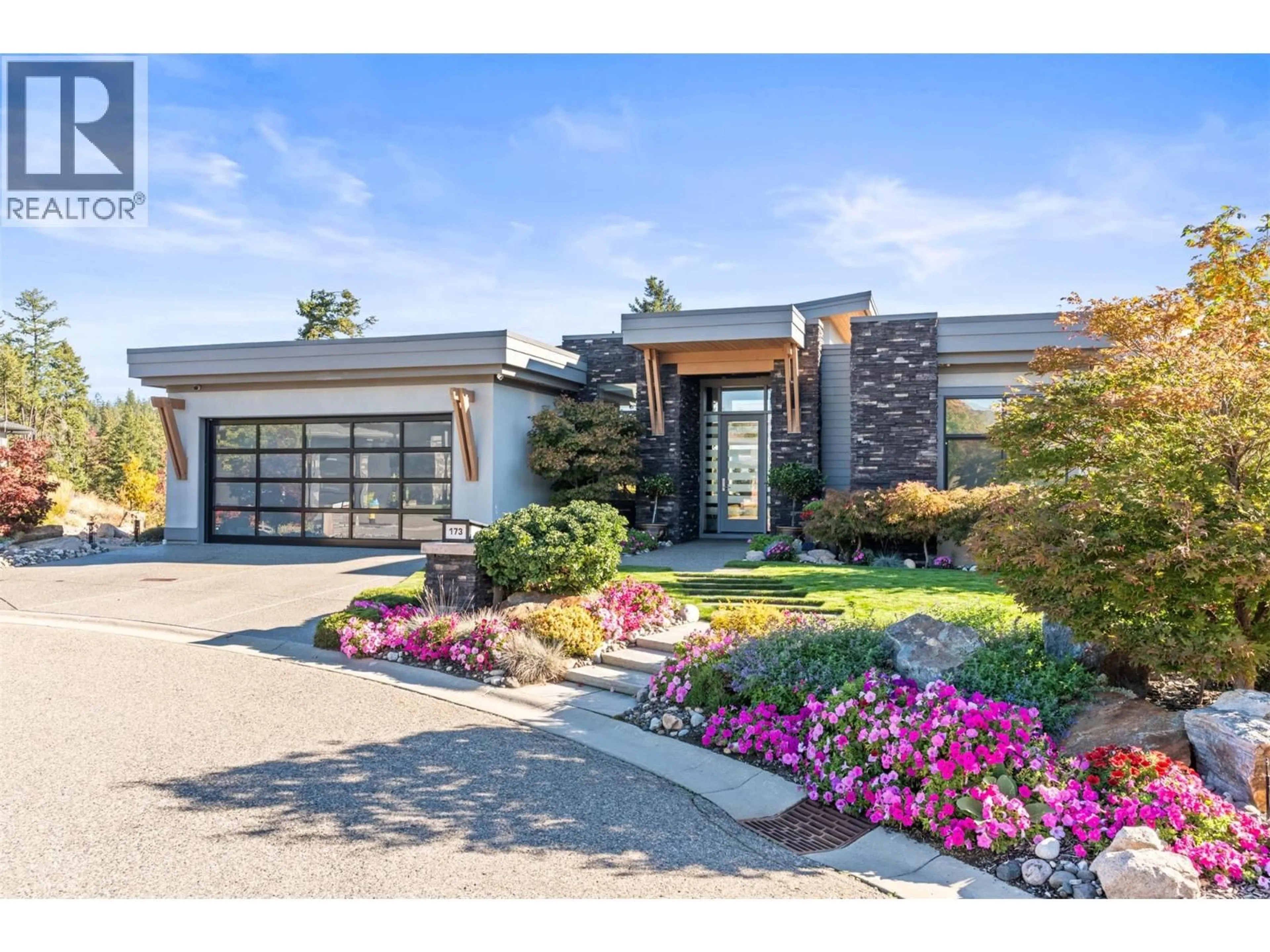 Home with brick exterior material, street for 173 WHITETAIL RIDGE, Vernon British Columbia V1H2L7