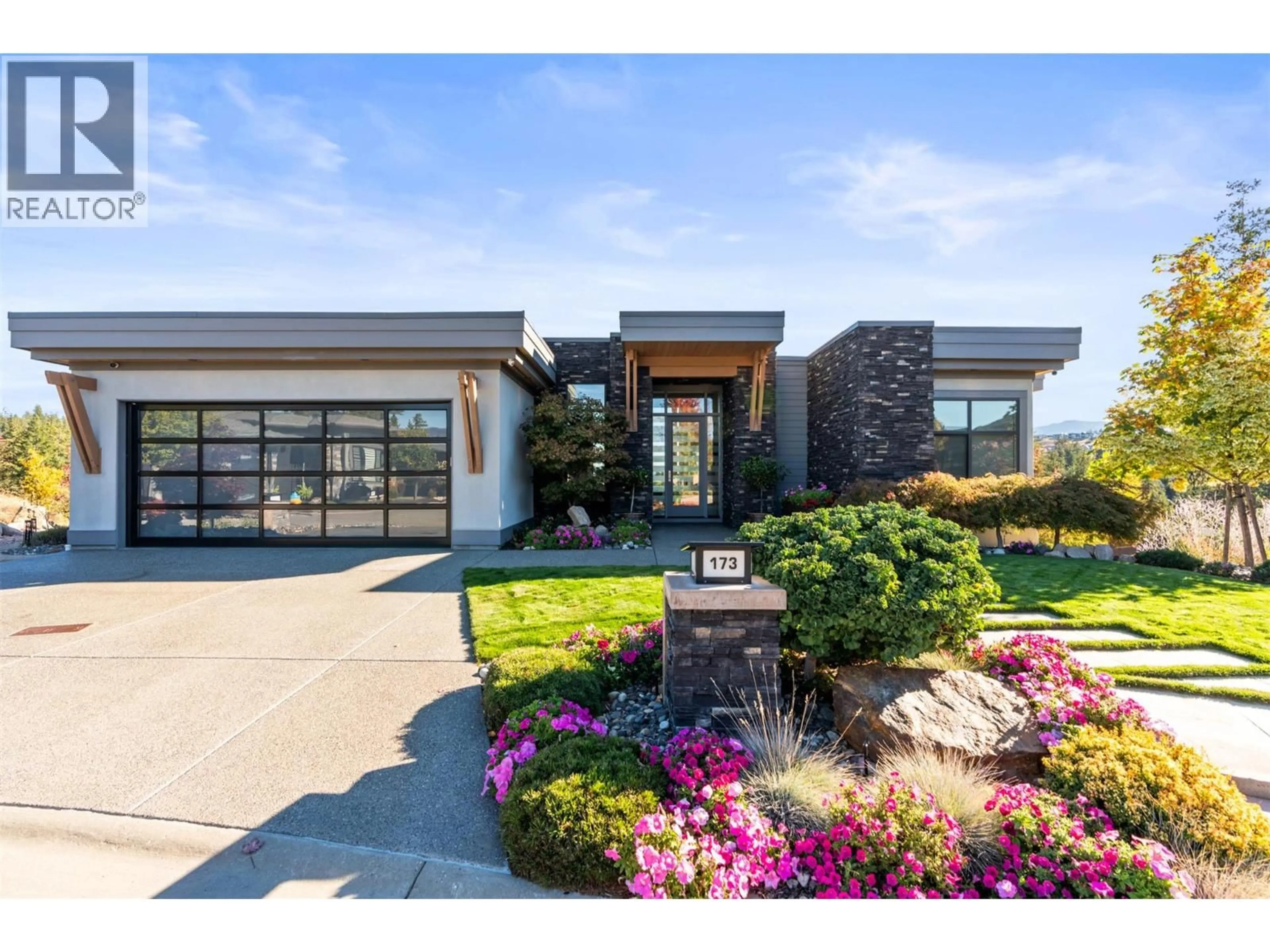 Home with brick exterior material, street for 173 WHITETAIL RIDGE, Vernon British Columbia V1H2L7