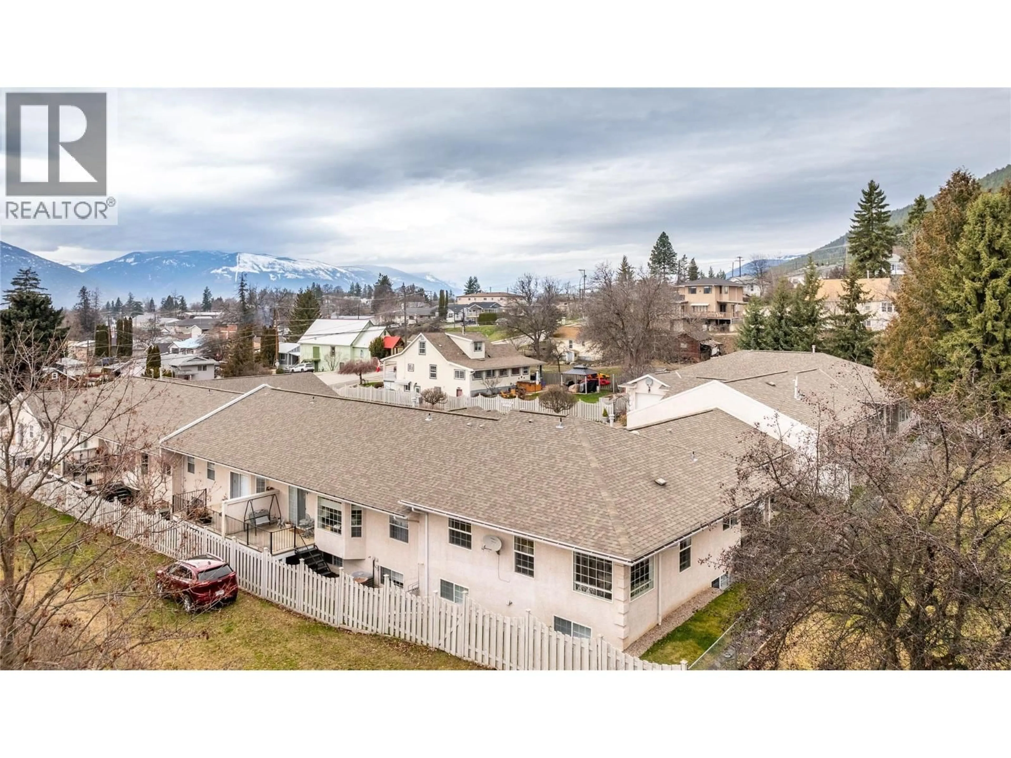 A pic from outside/outdoor area/front of a property/back of a property/a pic from drone, mountain view for 7 - 210 20TH  S AVENUE, Creston British Columbia V0B1G5