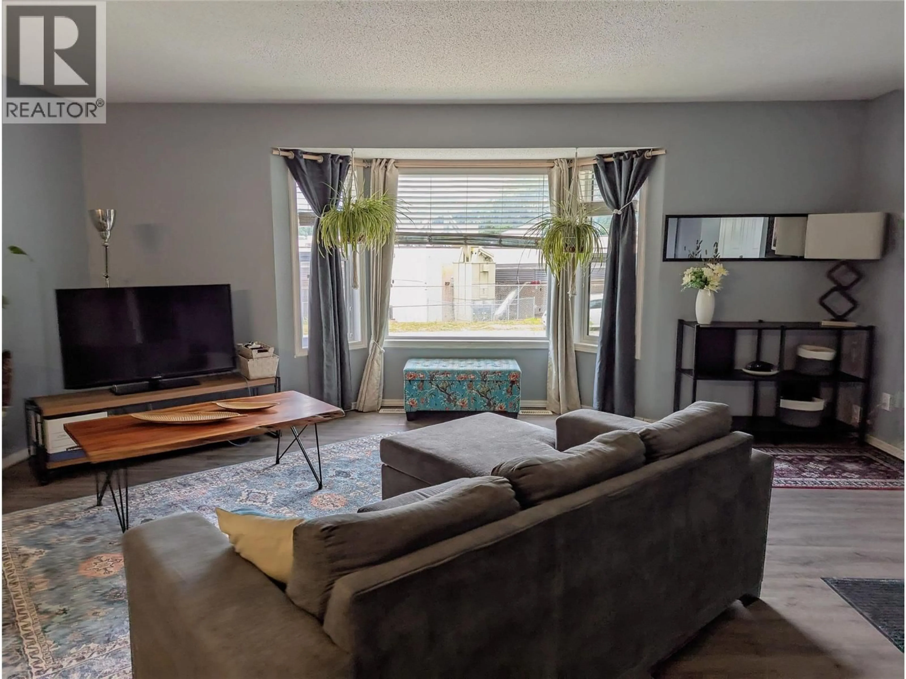 Living room with furniture, unknown for 710 IVY STREET, Castlegar British Columbia V1N2G4