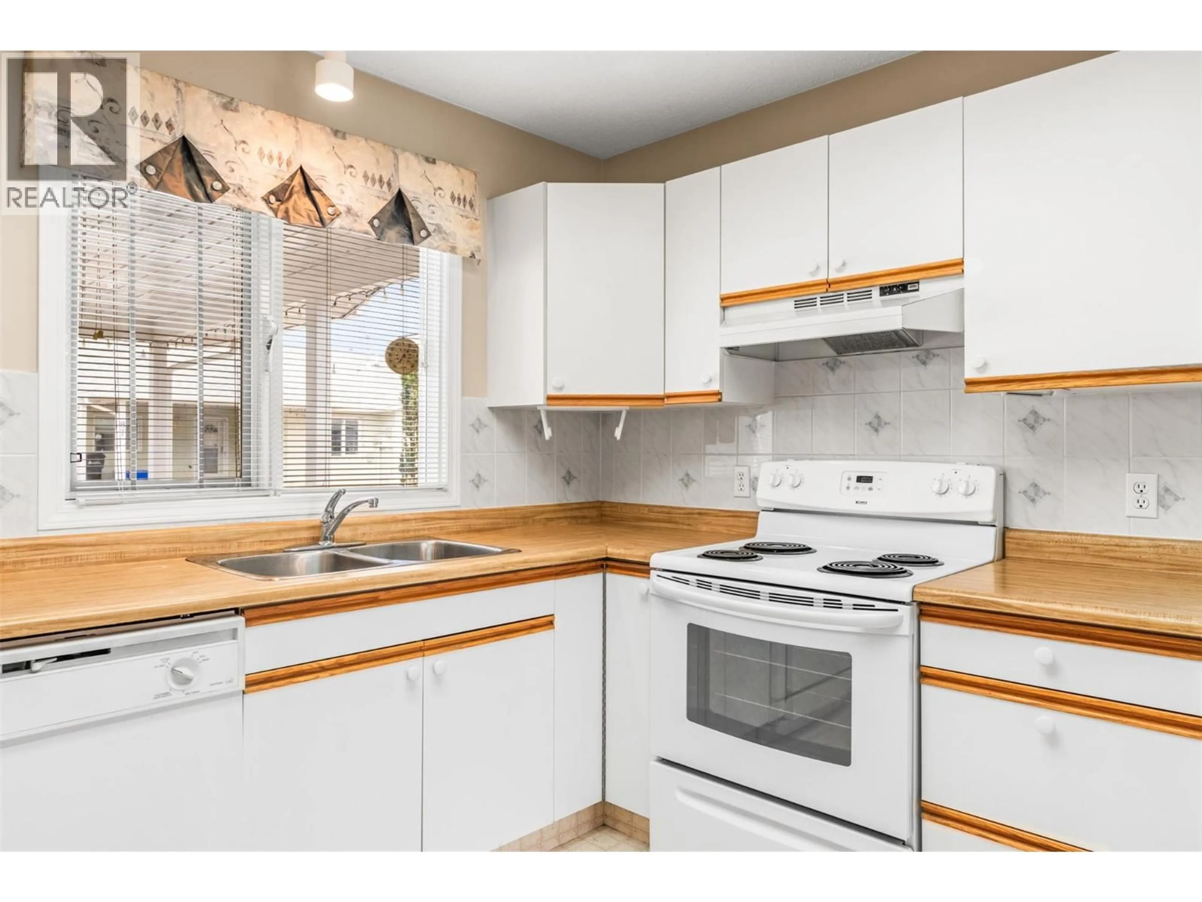 Standard kitchen, unknown for 102 - 3900 27 AVENUE, Vernon British Columbia V1T9E6