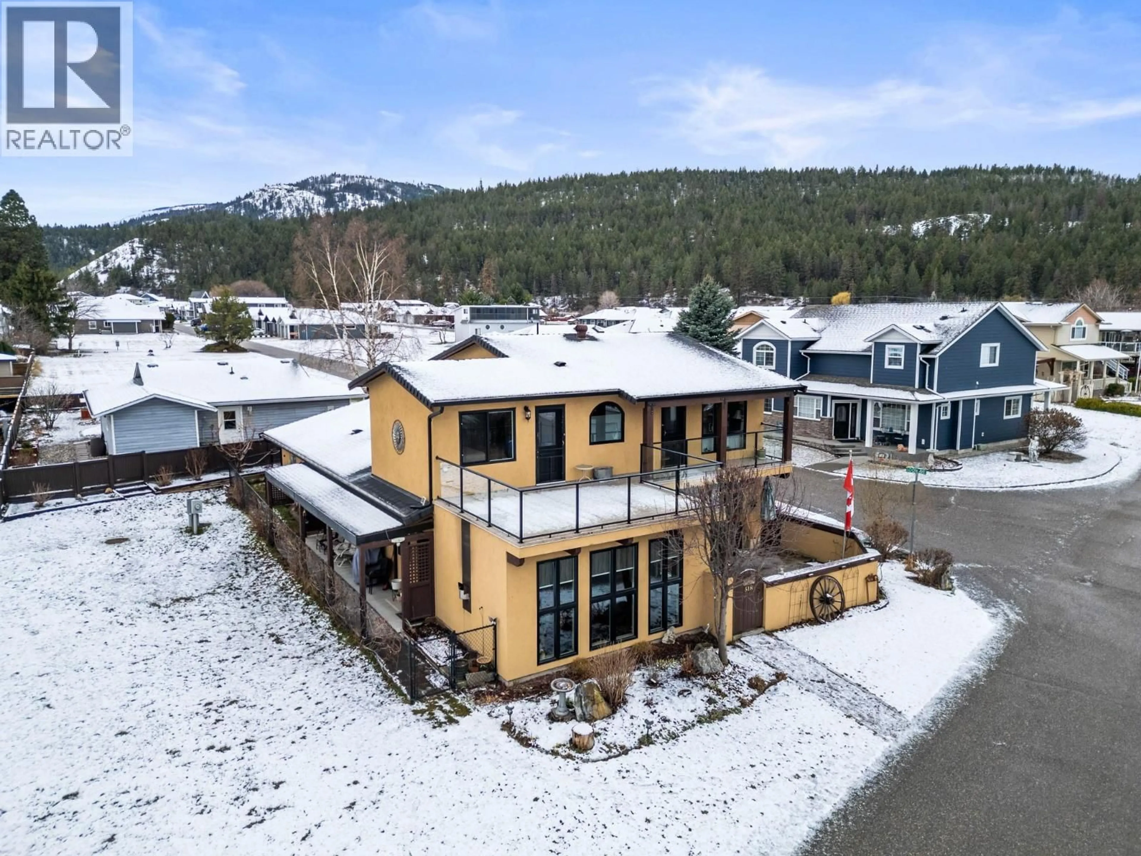 A pic from outside/outdoor area/front of a property/back of a property/a pic from drone, mountain view for 518 ELK STREET, Vernon British Columbia V1H2A1