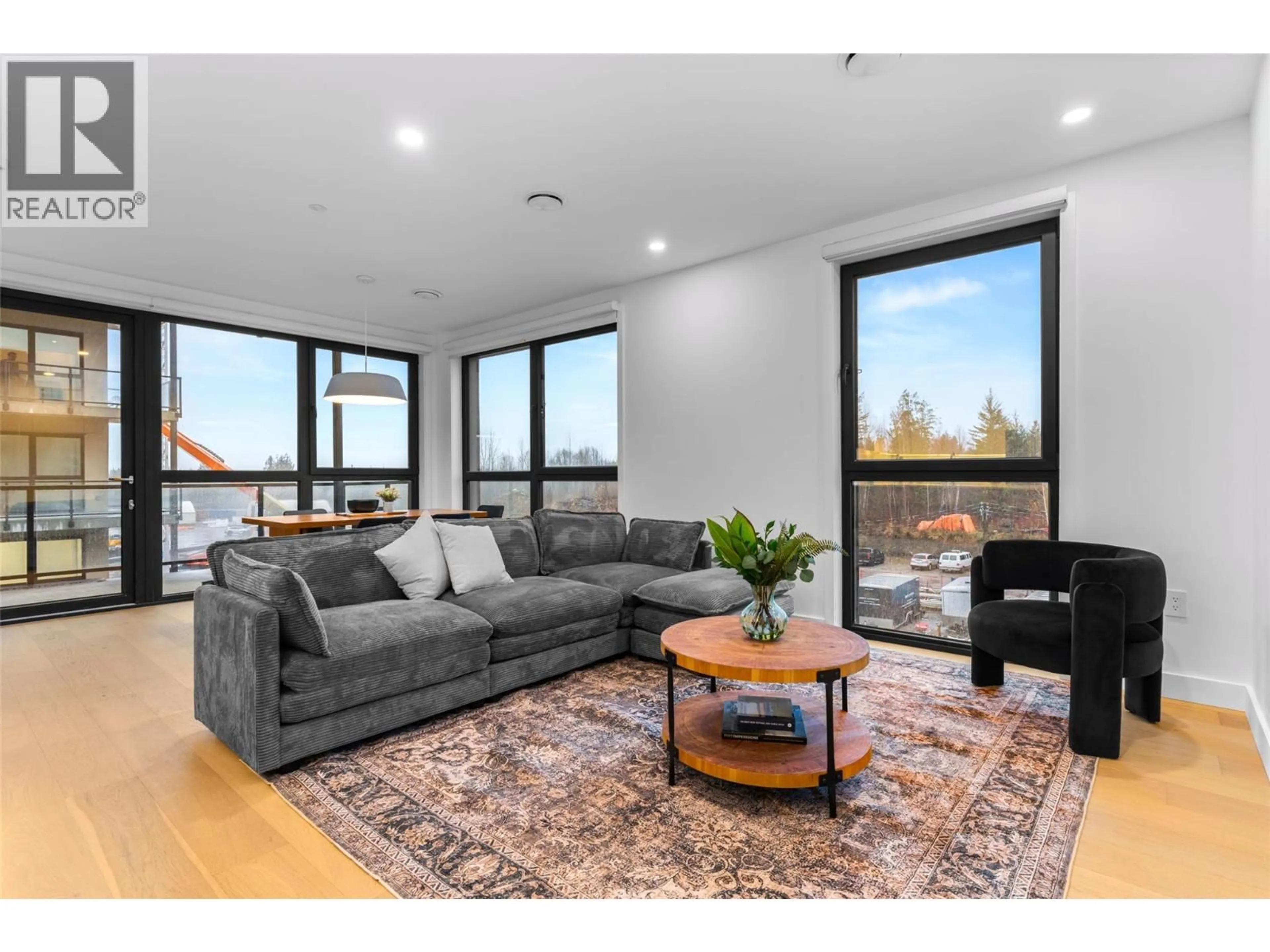 Living room with furniture, wood/laminate floor for 1301 - 1702 COURSIER AVENUE, Revelstoke British Columbia V0E2S3