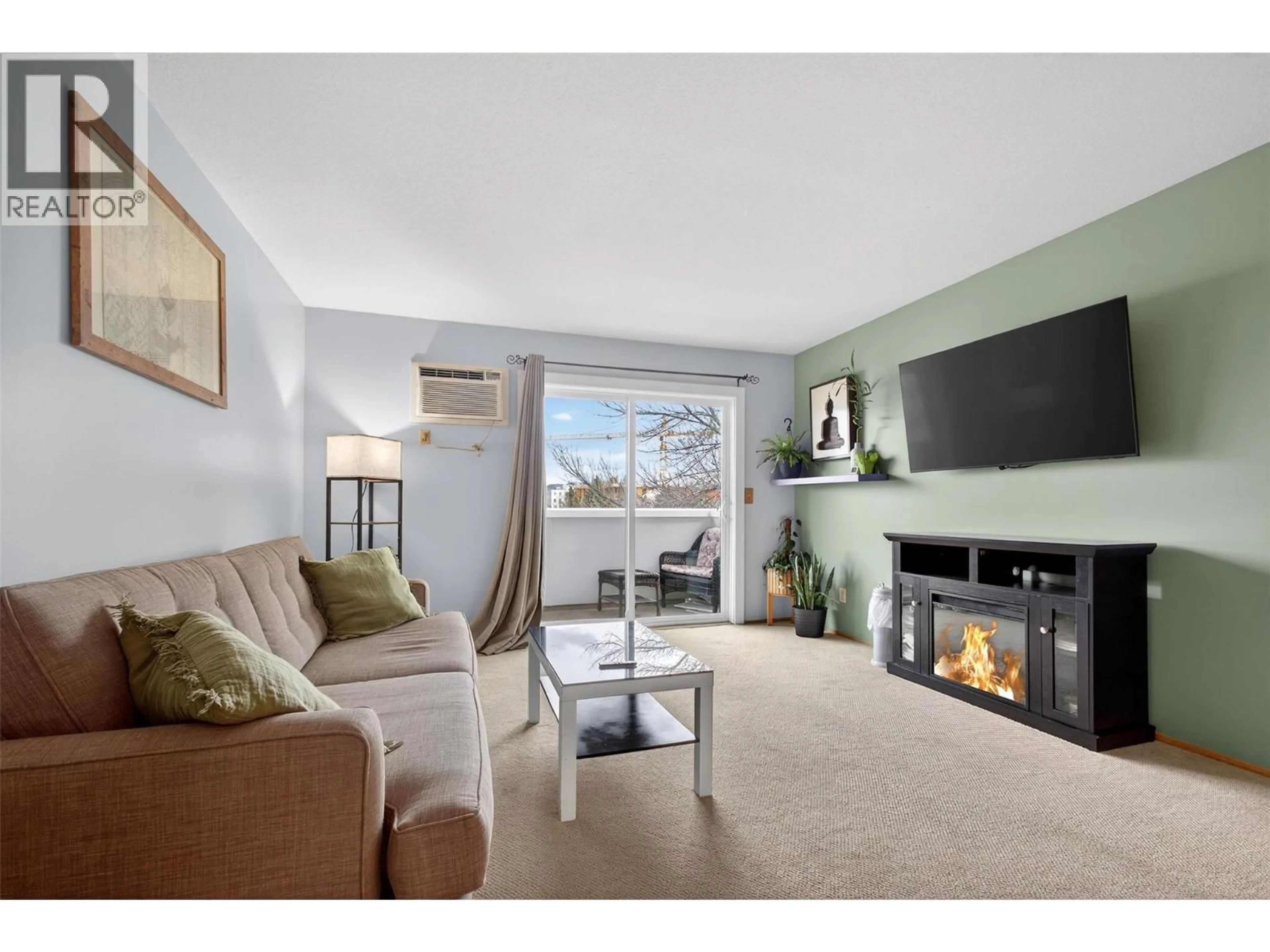 Living room with furniture, unknown for 412 - 3180 DE MONTREUIL COURT, Kelowna British Columbia V1W3W4