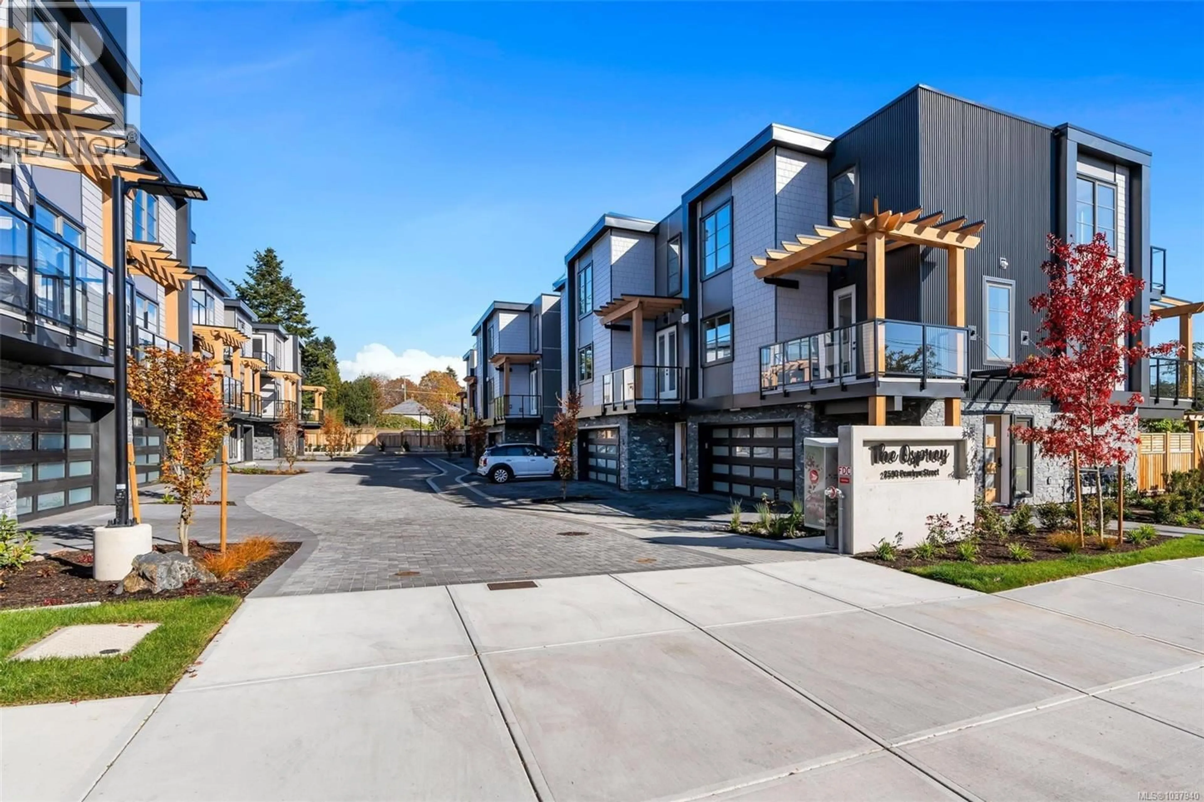 A pic from outside/outdoor area/front of a property/back of a property/a pic from drone, street for 5 - 2590 PENRHYN STREET, Saanich British Columbia V8N1G3