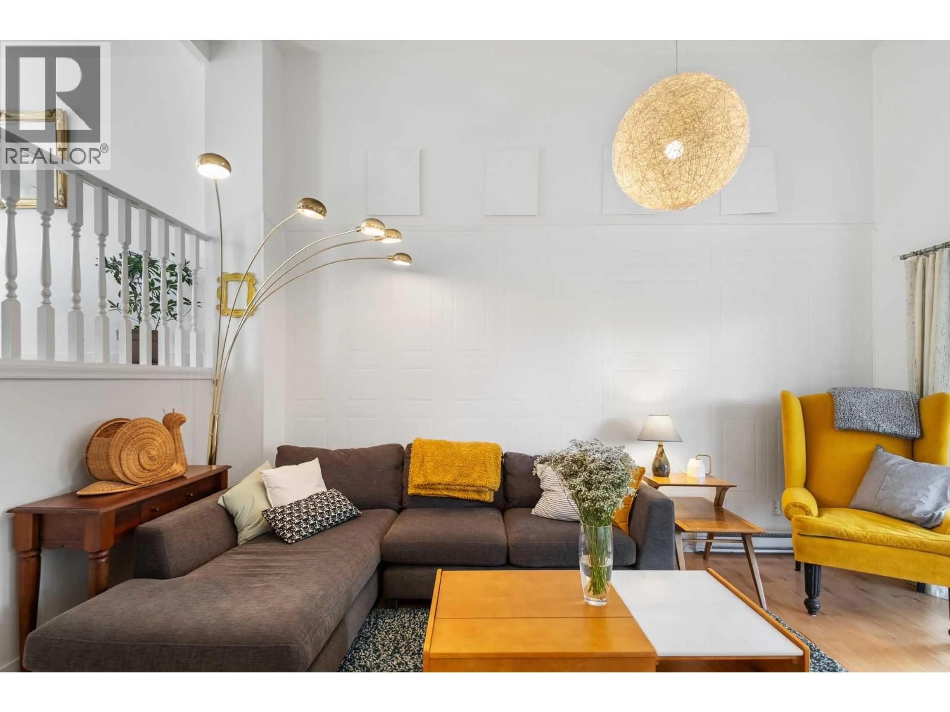 Living room with furniture, wood/laminate floor for 14 - 1985 BURTCH ROAD, Kelowna British Columbia V1Y4B4