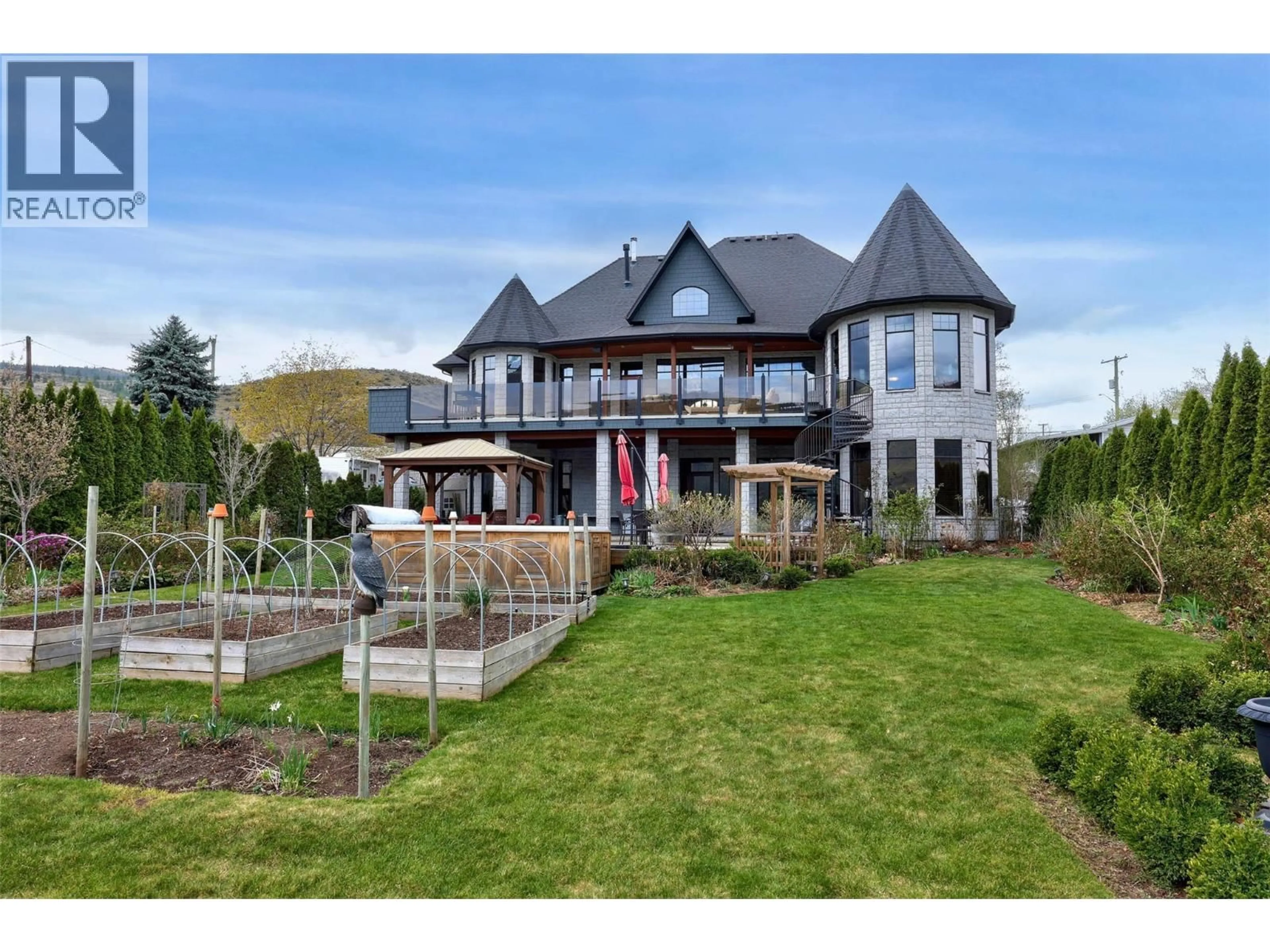 A pic from outside/outdoor area/front of a property/back of a property/a pic from drone, mountain view for 1580 LORNE STREET, Kamloops British Columbia V2C1X6