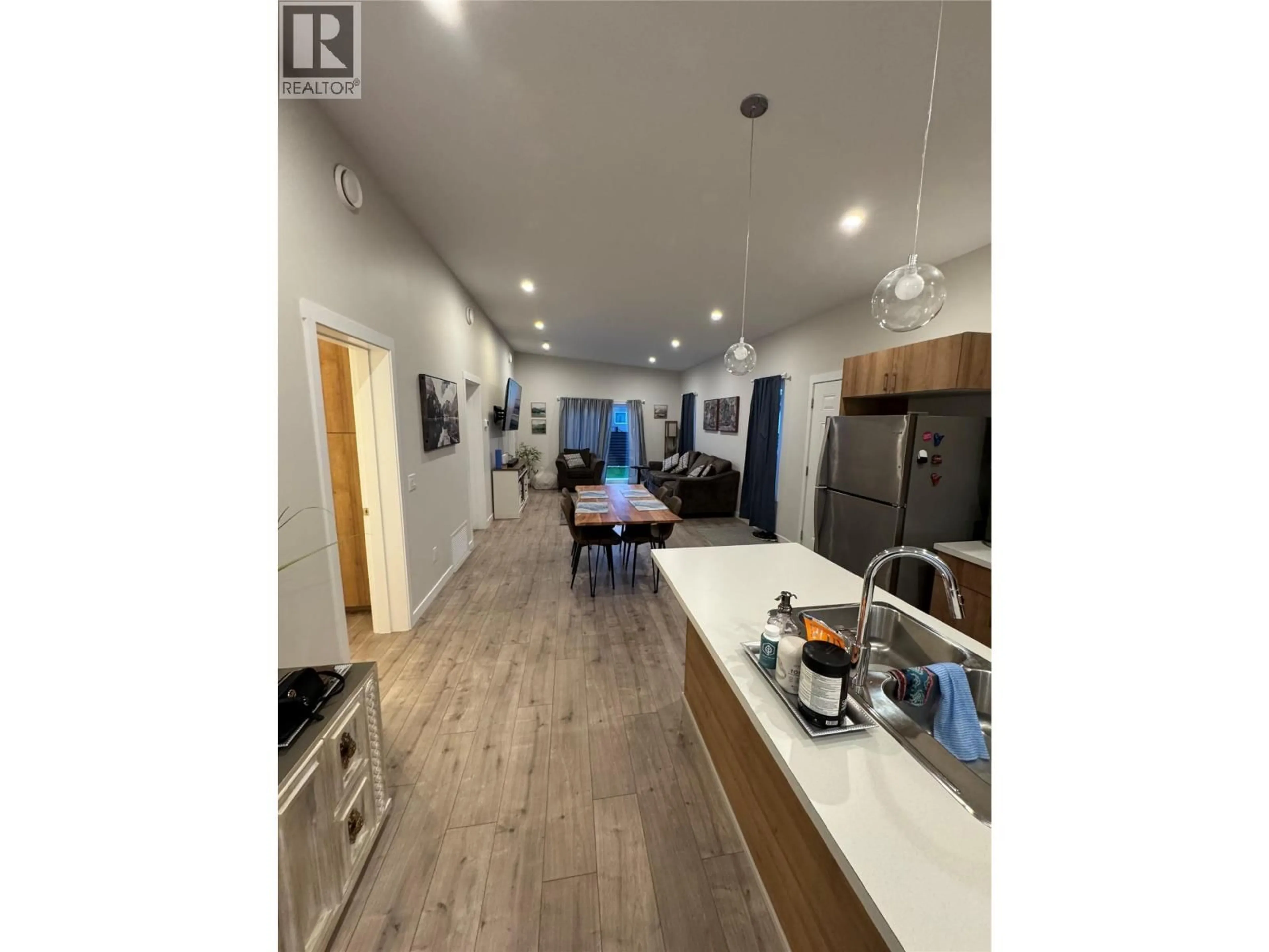 Open concept kitchen, wood/laminate floor for 71 - 8900 JIM BAILEY ROAD, Kelowna British Columbia V4V0B6