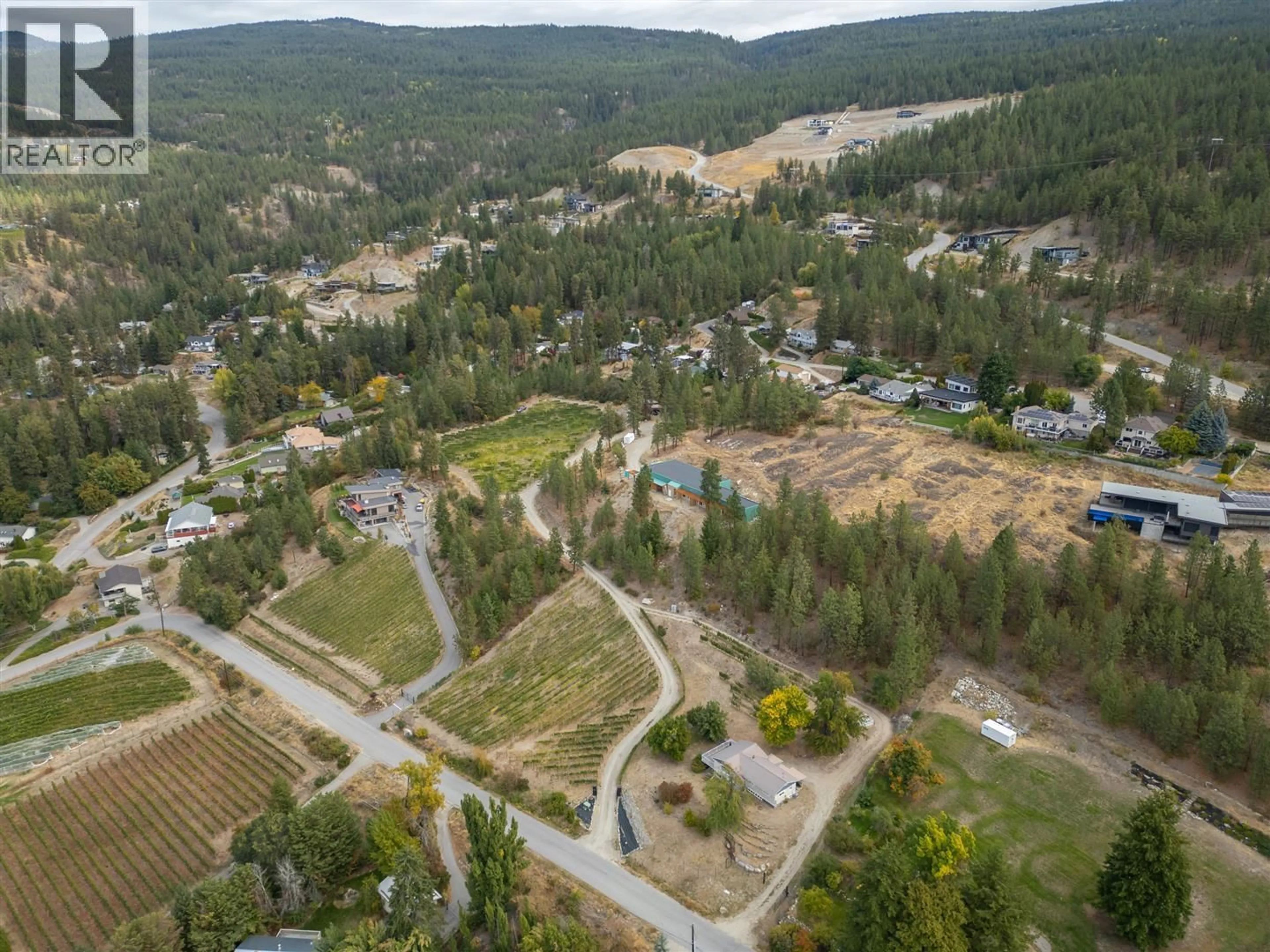 A pic from outside/outdoor area/front of a property/back of a property/a pic from drone, forest/trees view for 2864 ARAWANA ROAD, Naramata British Columbia V0H1N1