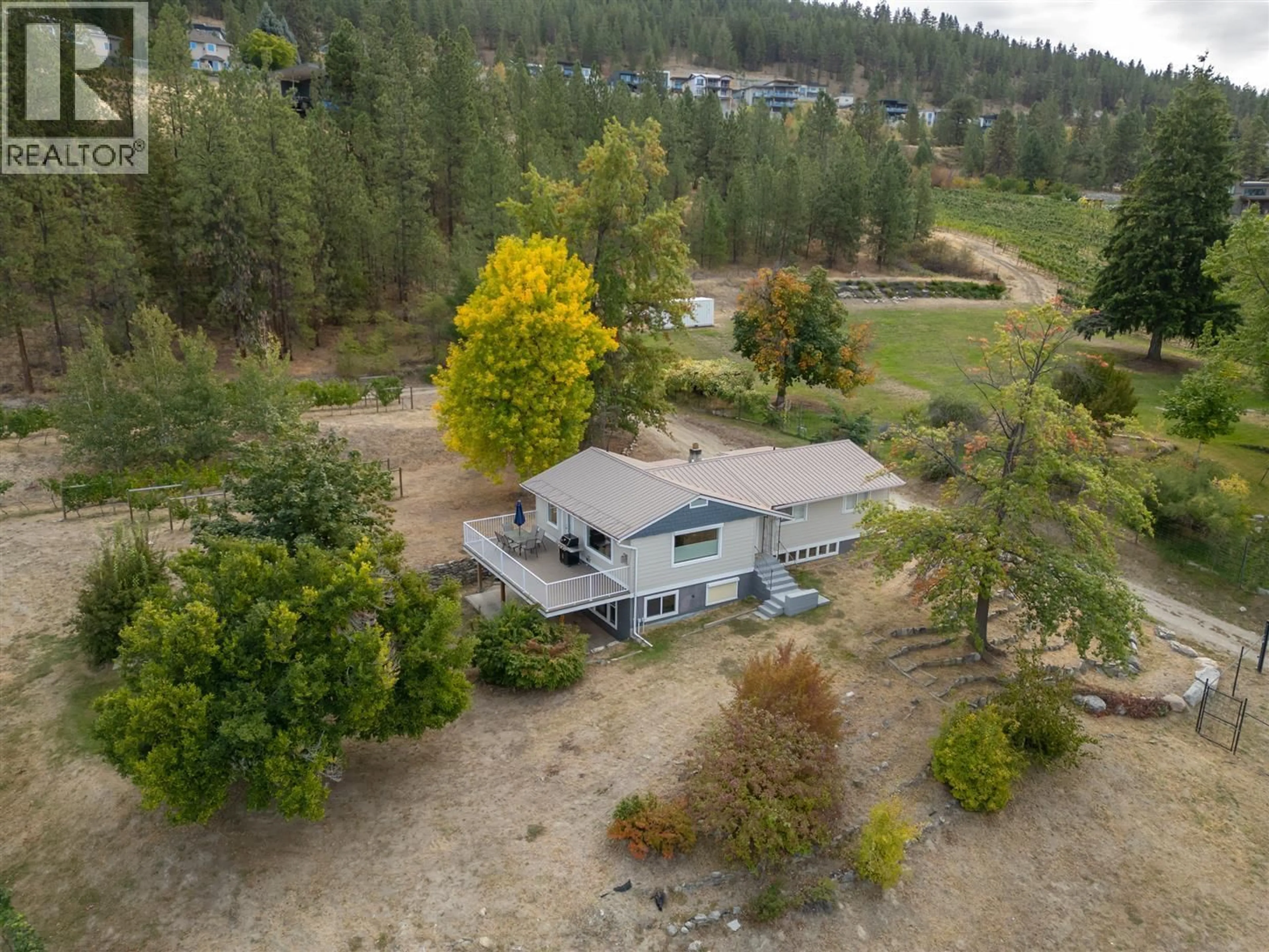 A pic from outside/outdoor area/front of a property/back of a property/a pic from drone, forest/trees view for 2864 ARAWANA ROAD, Naramata British Columbia V0H1N1