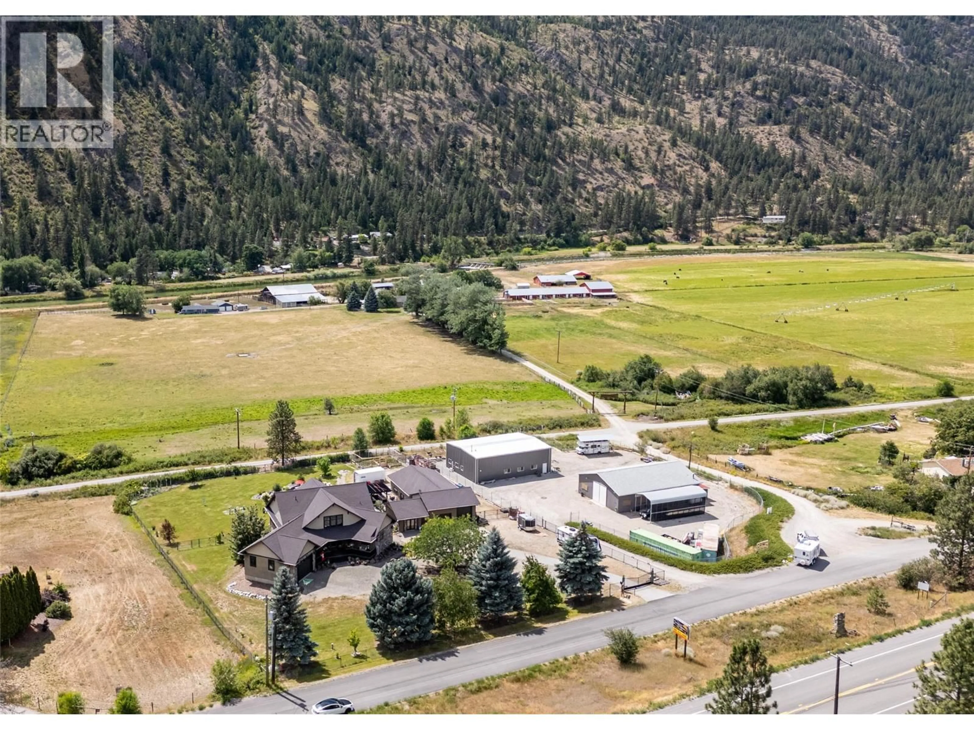 A pic from outside/outdoor area/front of a property/back of a property/a pic from drone, mountain view for 1788 ALBA ROAD, Okanagan Falls British Columbia V0H1R2